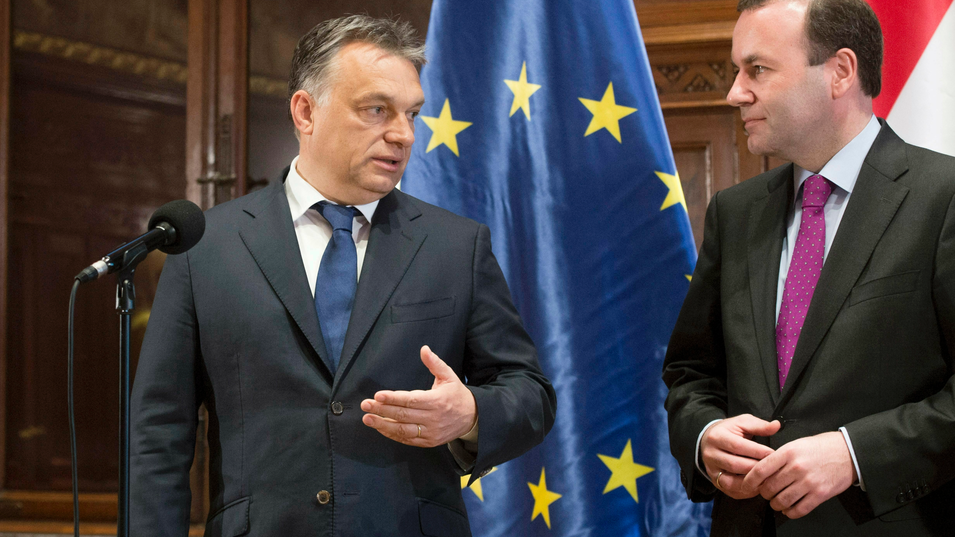 File - In this Thursday, June 4, 2015, file photo, Hungarian Prime Minister Viktor Orban, left, and group leader of the European People's Party, EPP, Manfred Weber, right, give a statement following their talks at the Hungarian Parliament in Budapest, Hungary. (Szilard Koszticsak/MTI via AP, File)