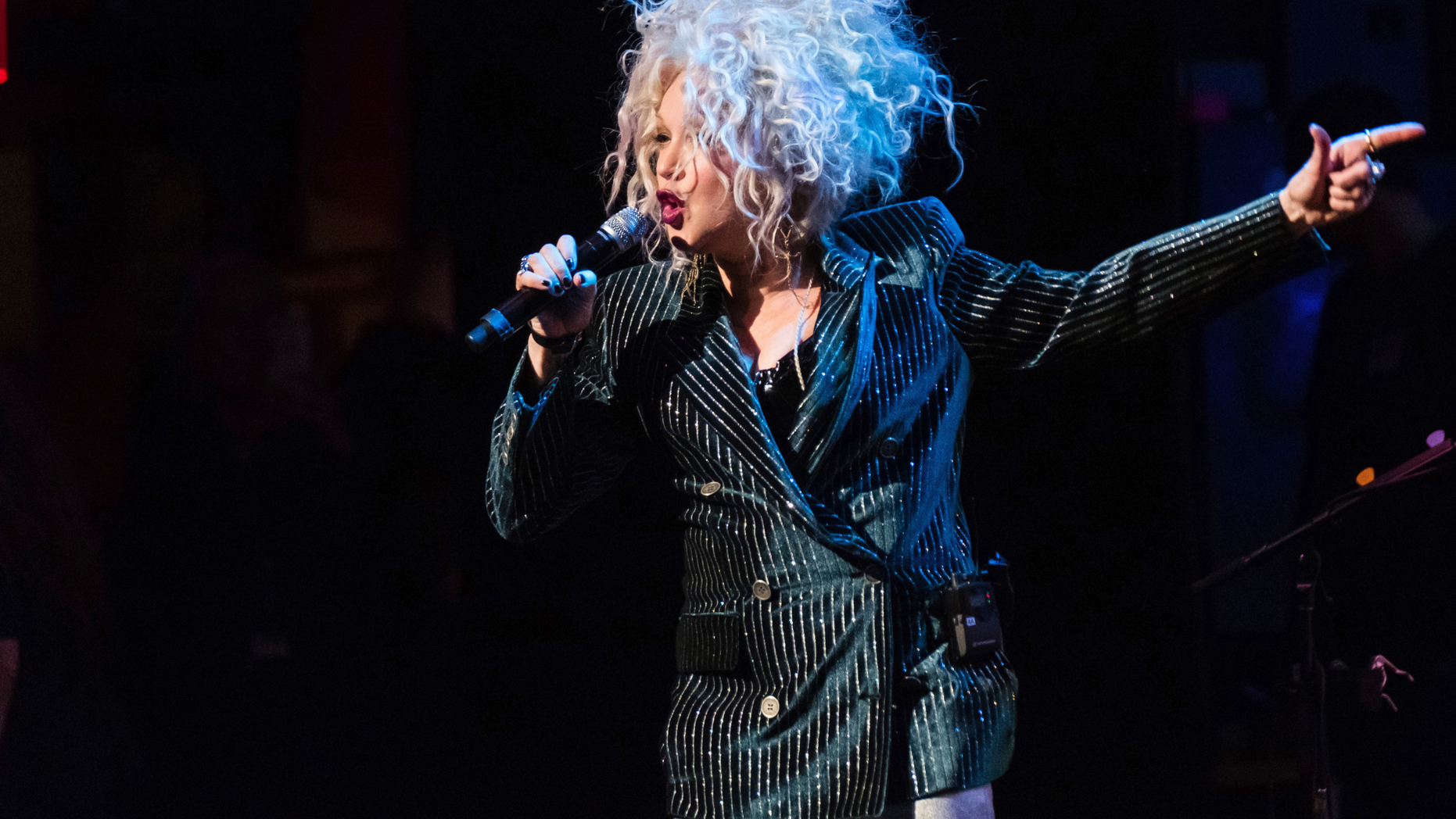 FILE - In this Dec. 8, 2018 file photo, Cyndi Lauper performs at the 8th annual "Home for the Holidays" benefit concert at the Beacon Theatre in New York. A university in Vermont has announced Lauper will return to the school to give its commencement address. Northern Vermont University-Johnson said Lauper will deliver the address May 18, 2019. (Photo by Charles Sykes/Invision/AP, File)