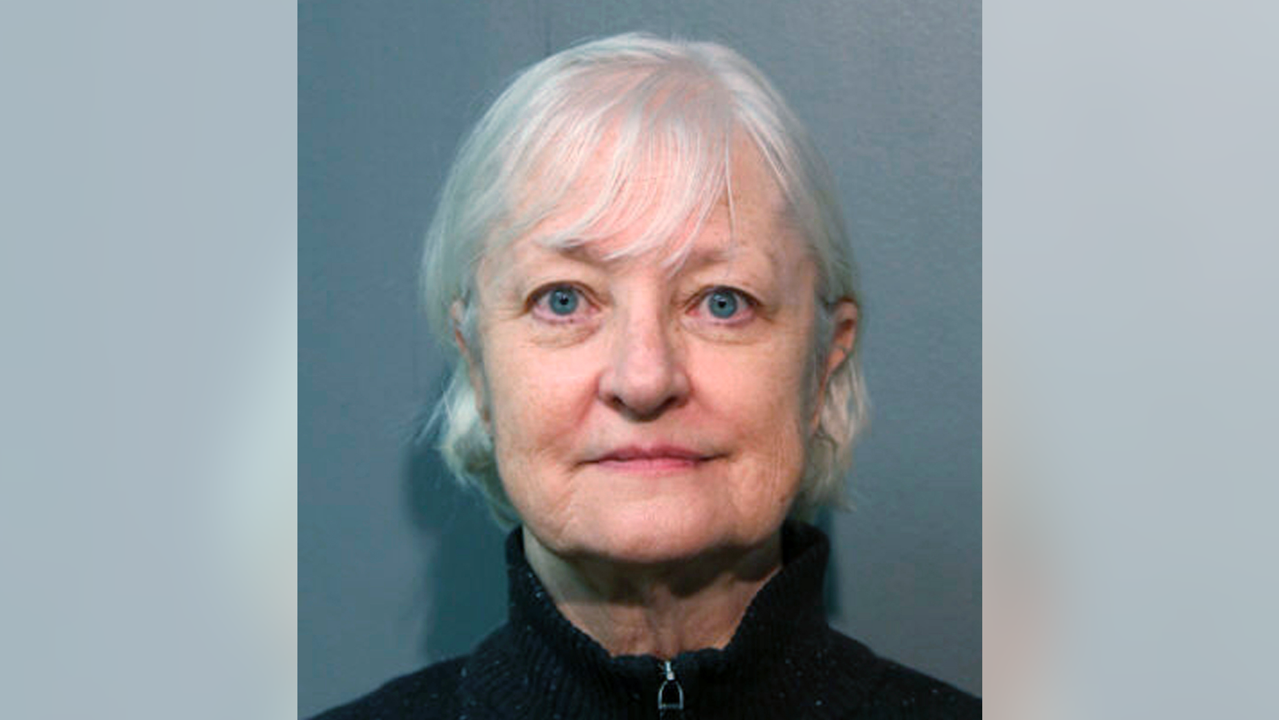 FILE - This January 2018, file photo provided by the Chicago Police Department shows Marilyn Hartman. Hartman, dubbed a serial stowaway, has been sentenced to 18 months of probation after pleading guilty to sneaking past Chicago airport security, boarding a plane and flying to London without a ticket. Marilyn Hartman told a Cook County judge Tuesday, March 19, 2019 that she apologizes to the airport and for "causing problems for them." As part of her plea deal, she can't go to Chicago's O'Hare or Midway airports without a ticket. (Chicago Police Department via AP, File)