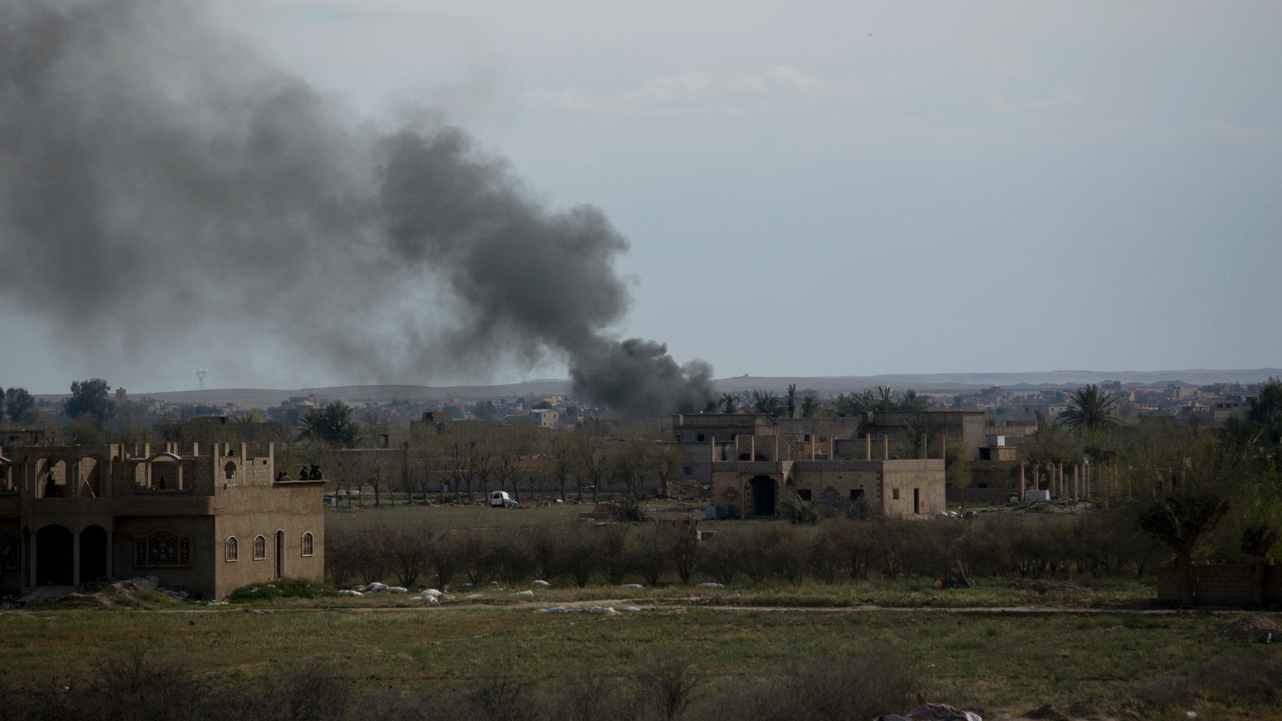 Smoke rises from a strike on Baghouz, Syria, on the Islamic State group's last piece of territory on Friday, March 22, 2019. (AP Photo/Maya Alleruzzo)