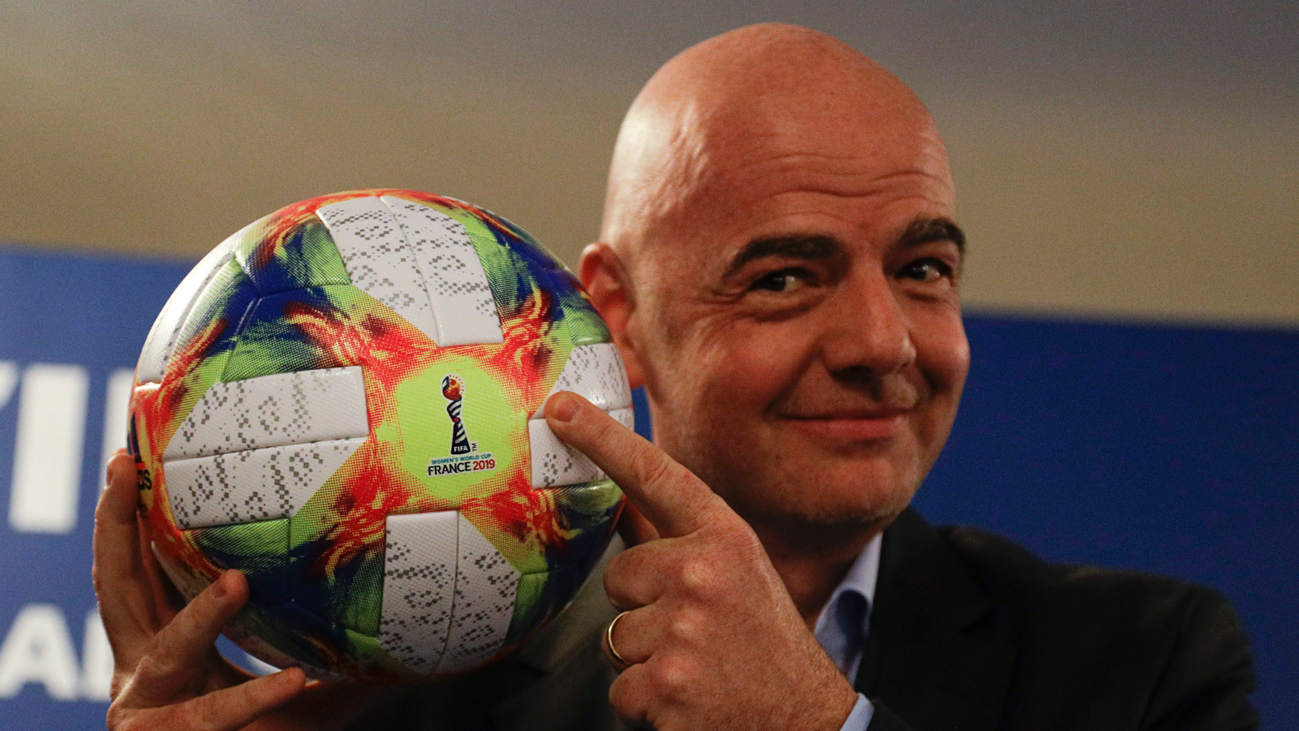 FIFA President Gianni Infantino holds the official ball of the next World Women's Football Championship and poses in front of photographers at a press conference at the end of an executive committee meeting Rome, Wednesday, February 27, 2019. (AP Photo / Gregorio Borgia)