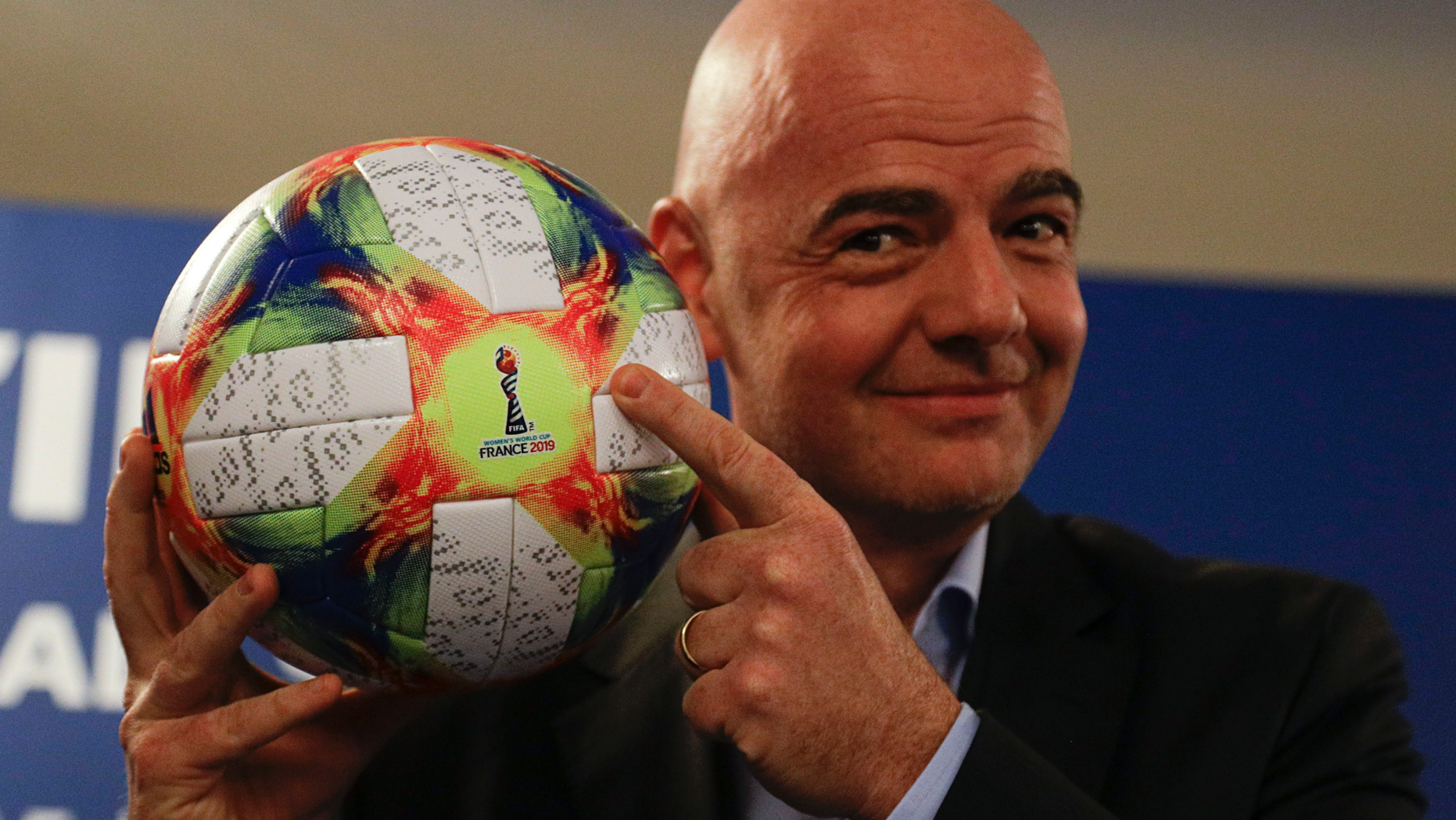 FIFA President Gianni Infantino holds the official ball of the upcoming Women's Soccer World Championship as he poses for photographers during a press conference at the end of an executive committee meeting in Rome, Wednesday, Feb. 27, 2019. (AP Photo/Gregorio Borgia)
