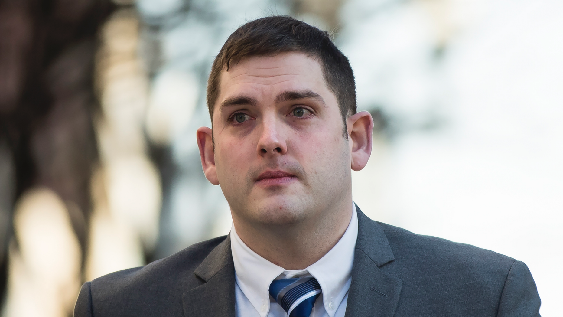 In this March 12, 2019 file photo, former East Pittsburgh police officer Michael Rosfeld, charged with homicide in the shooting death of Antwon Rose II, walks to the Dauphin County Courthouse in Harrisburg, Pa. A witness in the shooting of Rose by Rosfeld said Wednesday March 20, 2019 at his trial in Pittsburgh, that he saw the officer standing on the sidewalk, panicking, saying, "I don't know why I shot him. I don't know why I fired." (AP Photo/Matt Rourke)