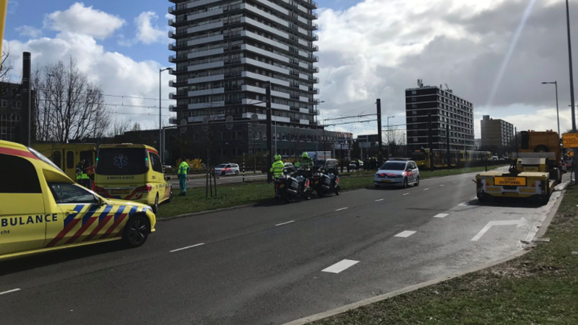Emergency services attend the scene of a shooting in Utrecht, Netherlands, Monday March 18, 2019. Police in the central Dutch city of Utrecht say on Twitter that "multiple" people have been injured as a result of a shooting in a tram in a residential neighborhood. (Martijn van der Zande via AP)