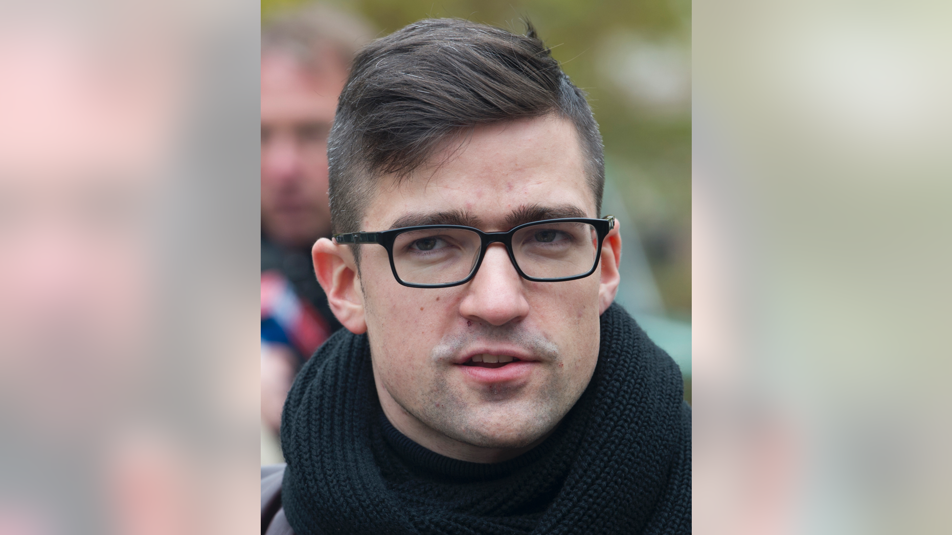 File--- In this picture taken Nov.5, 2016 Martin Sellner, leader of the right-wing populist Identitarian movement of Austria is seen giving an interview in Berlin, Germany. (Paul Zinken/dpa via AP)