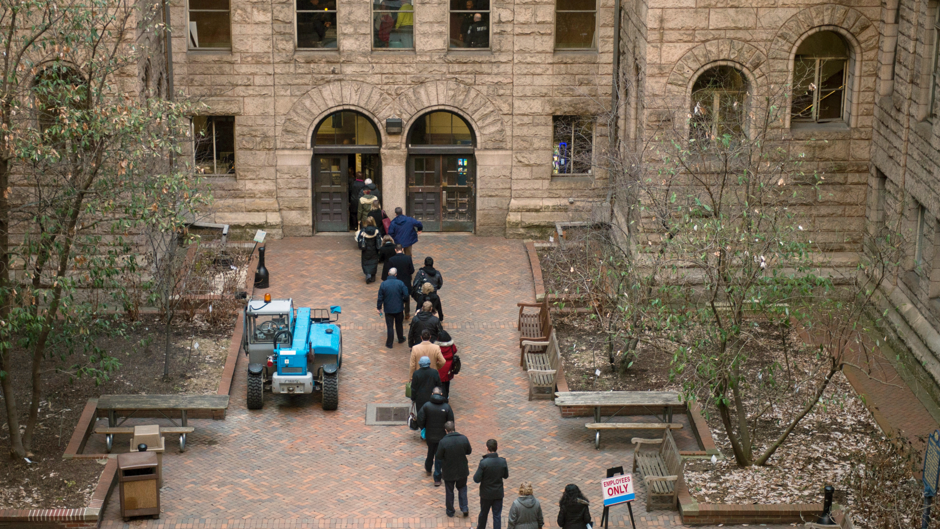 People arrive at the Allegheny County Courthouse before the start of the second day of the trial for homicide of former East Pittsburgh police officer, Michael Rosfeld, on Wednesday, March 20, 2019 in Pittsburgh. Rosfeld, 30, faces a charge of criminal homicide for the death in June 2018 of Antwon Rose II, a 17-year-old unarmed high school student. (Nate Smallwood / Pittsburgh Tribune-Review via AP, Pool)