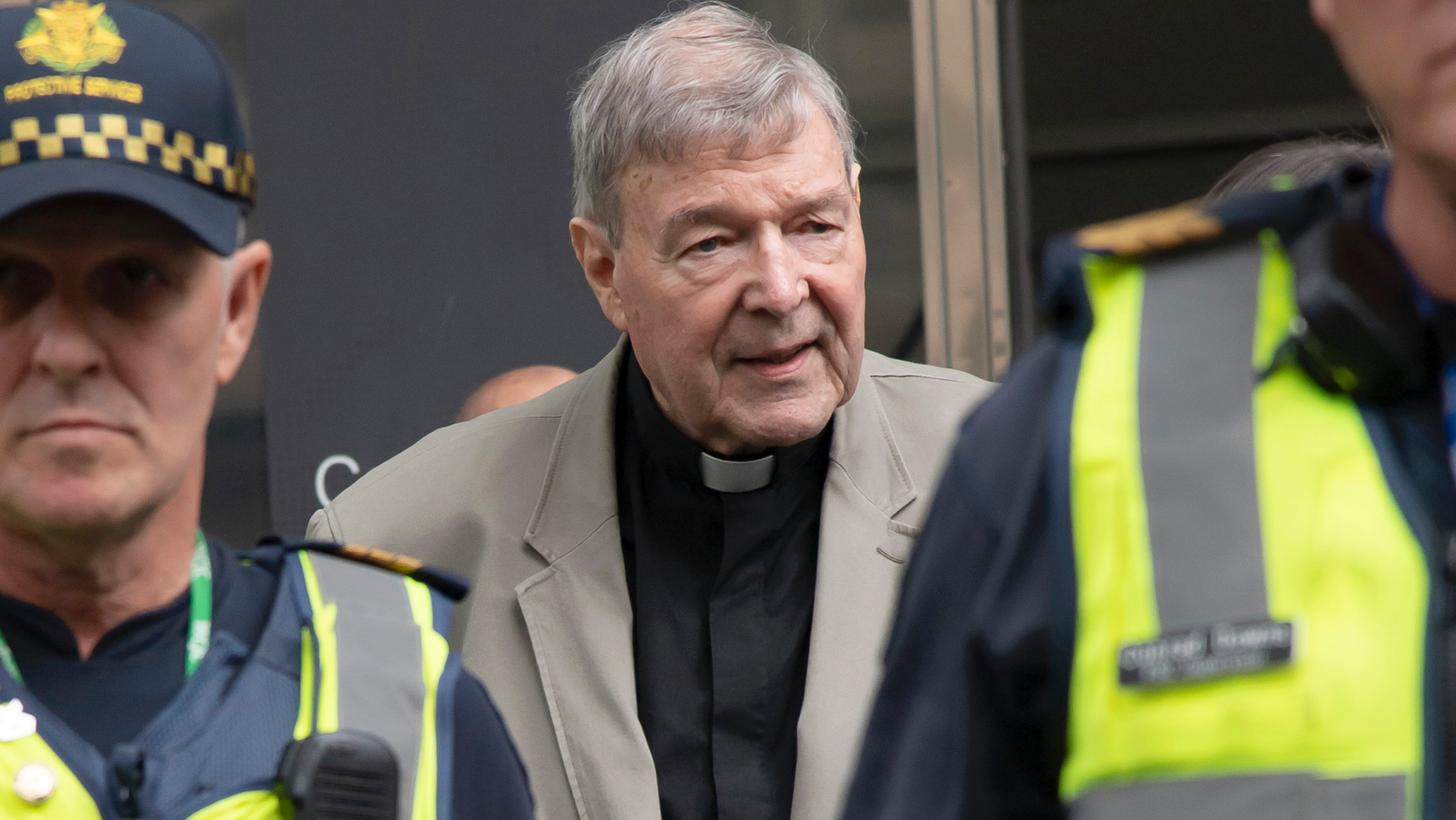 FILE - In this Feb. 26, 2019, file photo, Cardinal George Pell arrives at the County Court in Melbourne, Australia. The most senior Catholic to be convicted of child sex abuse will be sentenced to prison on Wednesday, March 13, 2019 in an Australia landmark case that has polarized observers. Some described the prosecution as proof the church is no longer above the law, while others suspect Cardinal George Pell has been made a scapegoat for the church’s sins. (AP Photo/Andy Brownbill, File)