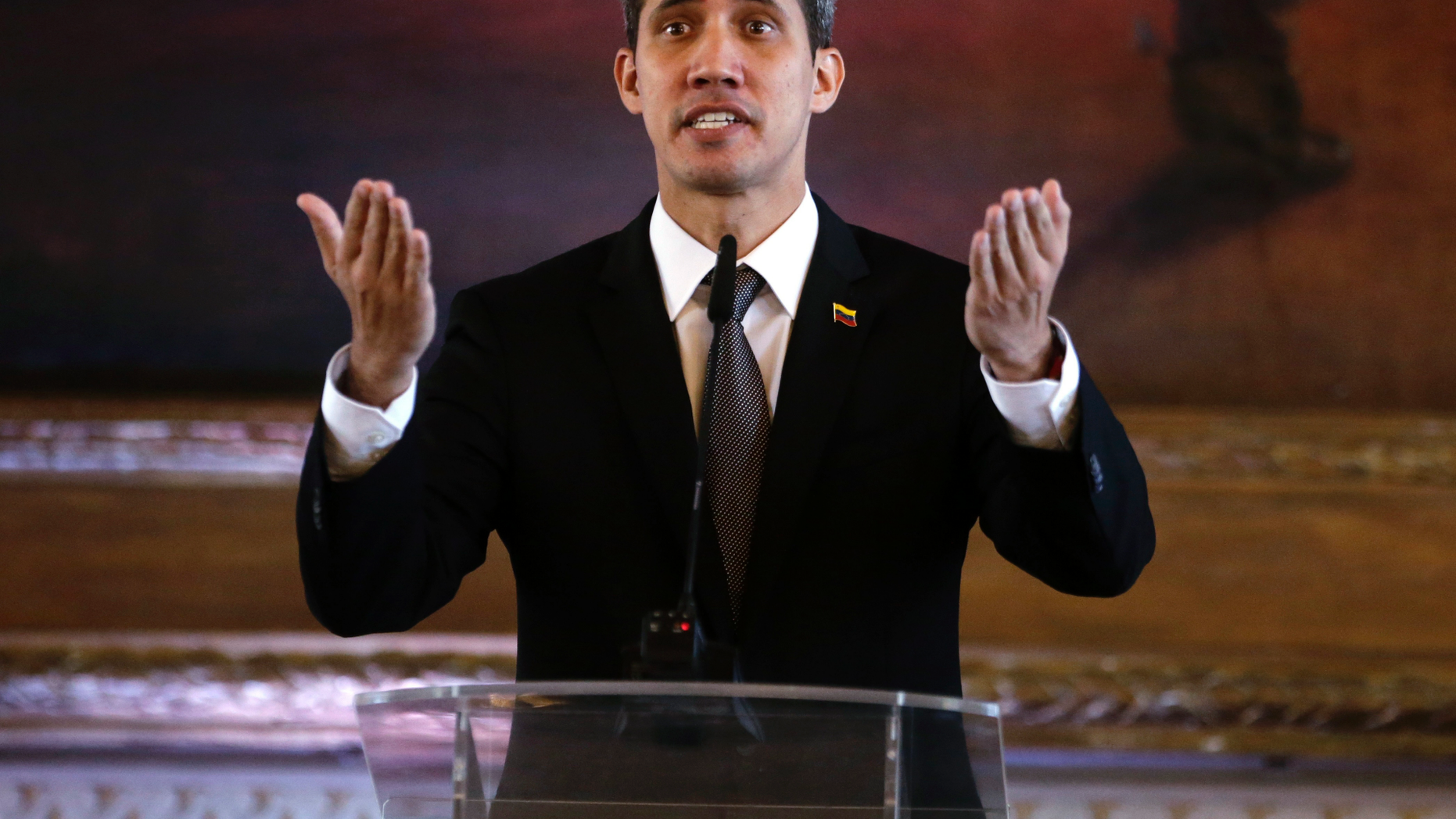 Venezuela's self-proclaimed interim president Juan Guaido talks during a joint press conference with his Paraguayan counterpart during an official visit, in Asuncion, Paraguay, Friday, March 1, 2019. Guaido met with Paraguay's President Abdo Benitez, who recognizes Guaido as Venezuela's leader and has taken a hard line against Venezuelan President Nicolas Maduro. (AP Photo/Jorge Saenz)