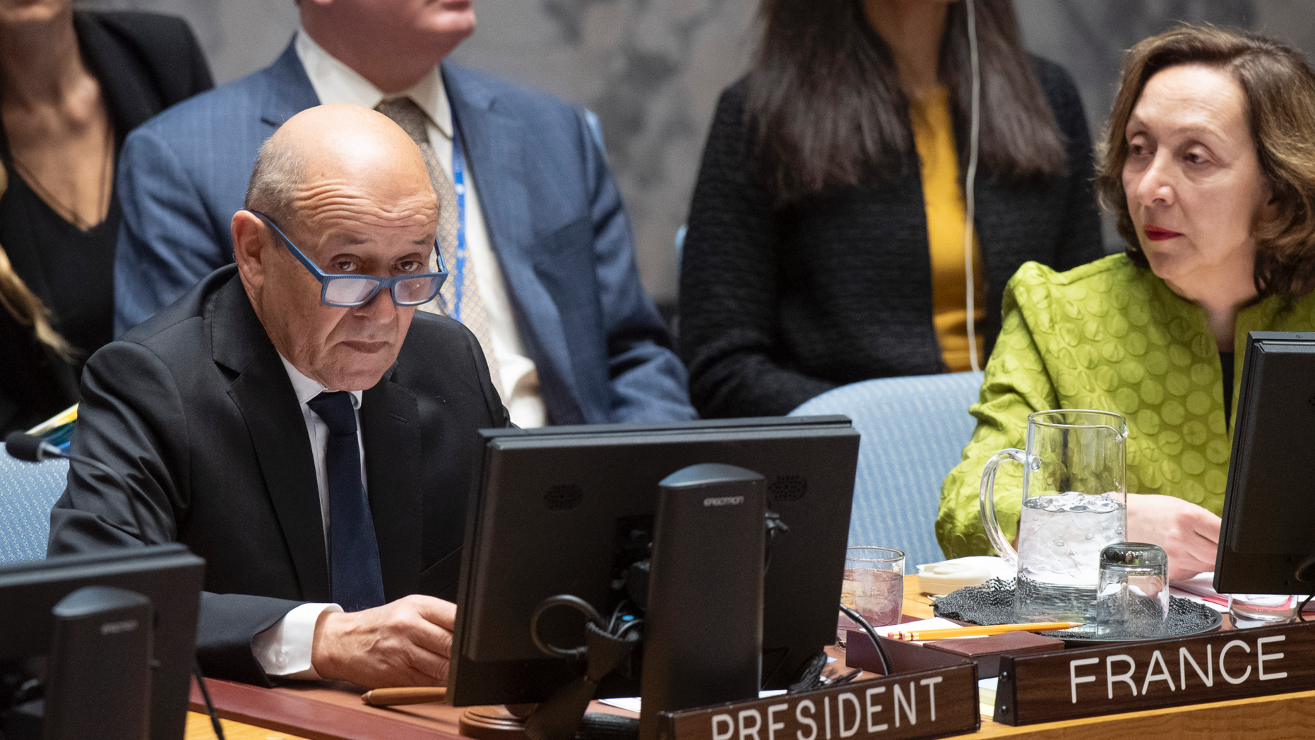Jean-Yves Le Drian, United Nations Security Council president, speaks at the UN headquarters about threats to international peace and security caused by terrorist acts, Thursday, March 28, 2019. The U.N. Security Council has unanimously adopted a resolution aimed at strengthening global efforts to combat the numerous and new ways that terrorist groups raise funds to finance their operations. The French-drafted resolution approved Thursday orders all countries to ensure that their domestic laws are sufficient to prosecute and penalize those responsible for directly or indirectly financing "terrorist organizations or individual terrorists for any purpose." At right is Hasmik Egian, Director of the Security Council Affairs Division of the Department of Political and Peacebuilding Affairs. (Eskinder Debebe/United Nations via AP)