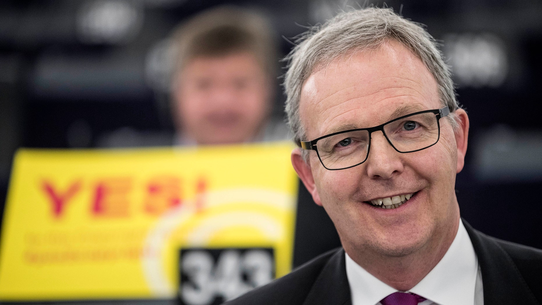 Axel Voss, Member of the European Parliament and rapporteur of the copyright bill, poses for the media at the European Parliament in Strasbourg, France, Tuesday March 26, 2019. The European Parliament is furiously debating the pros and cons of a landmark copyright bill one last time before the legislature will vote on it later. (AP Photo/Jean-Francois Badias)