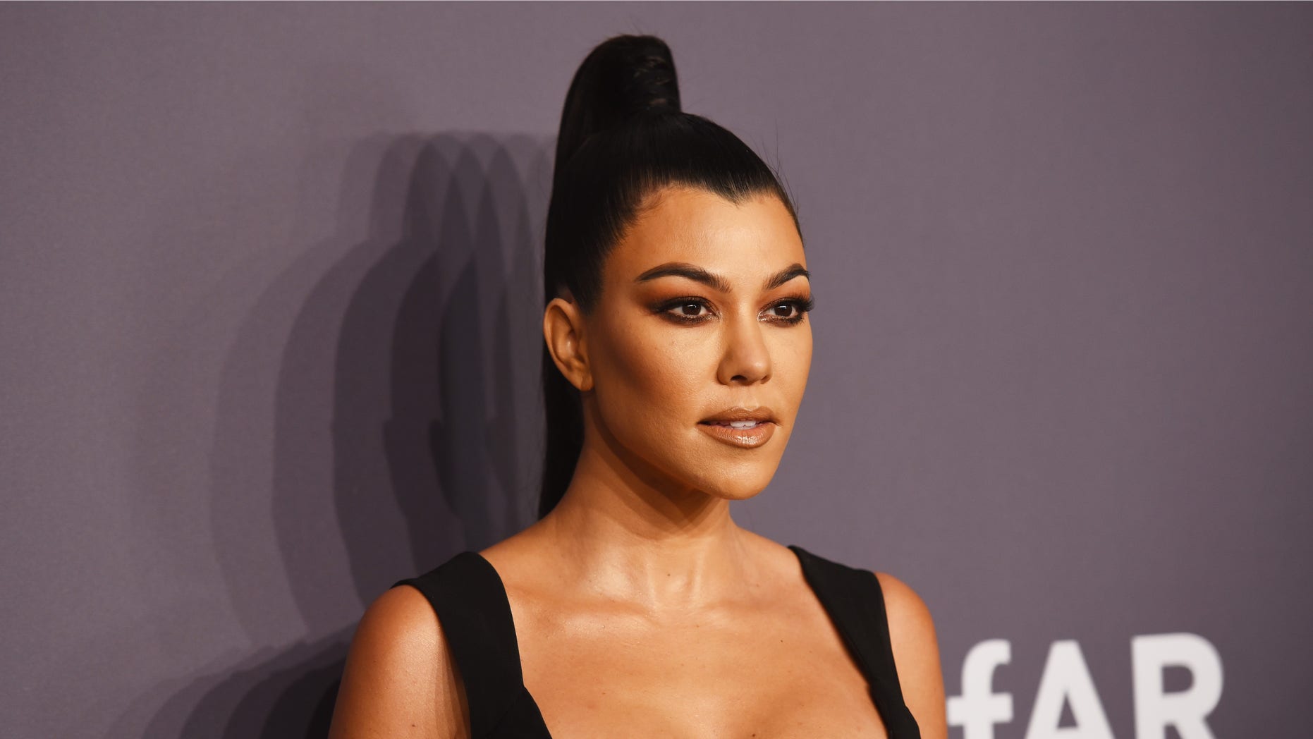 Kourtney Kardashian bares all to announce her latest project, "Poosh."