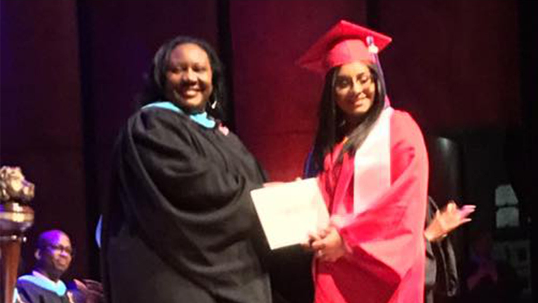 Iris Marquez addressed her fellow classmates and urged them to "reach for the sky."