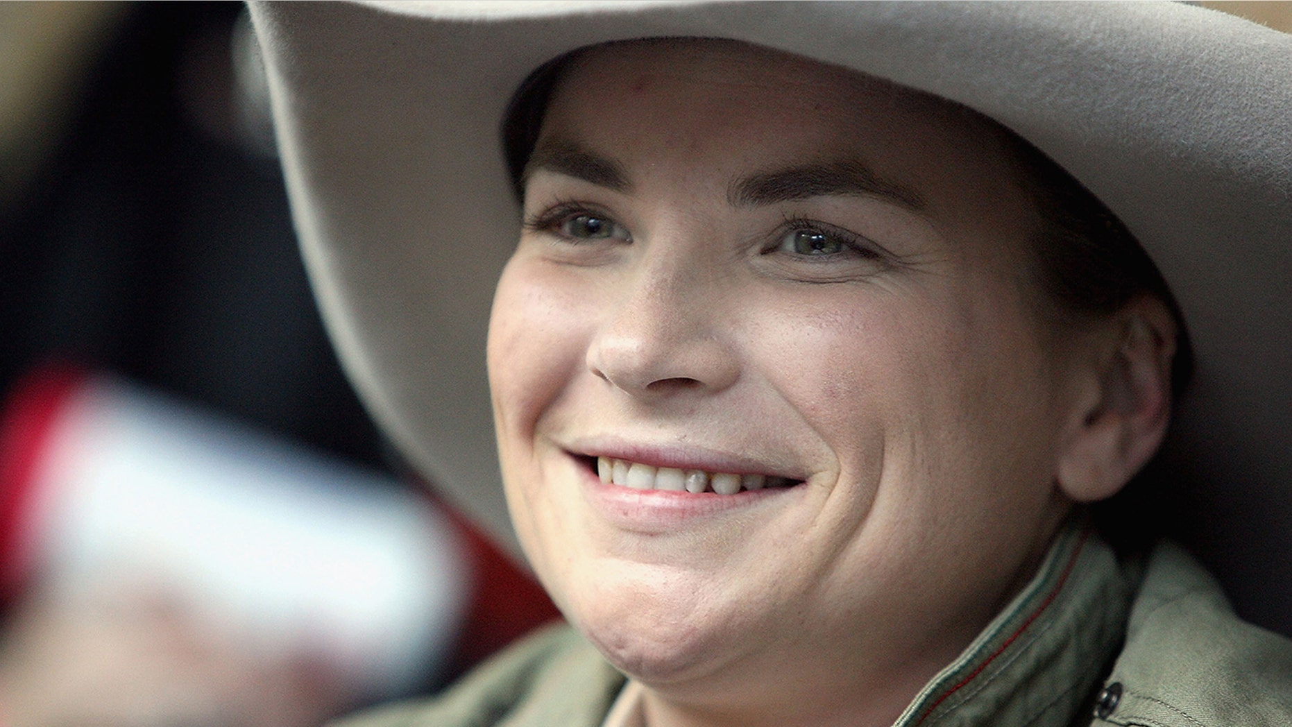 Kate Cook, one of the final 10 Australian Idol 2009 contestants, signs autographs for fans before a free concert as part of the 2009 Toyota AFL Grand Final Week at Federation Square on September 23, 2009 in Melbourne, Australia.