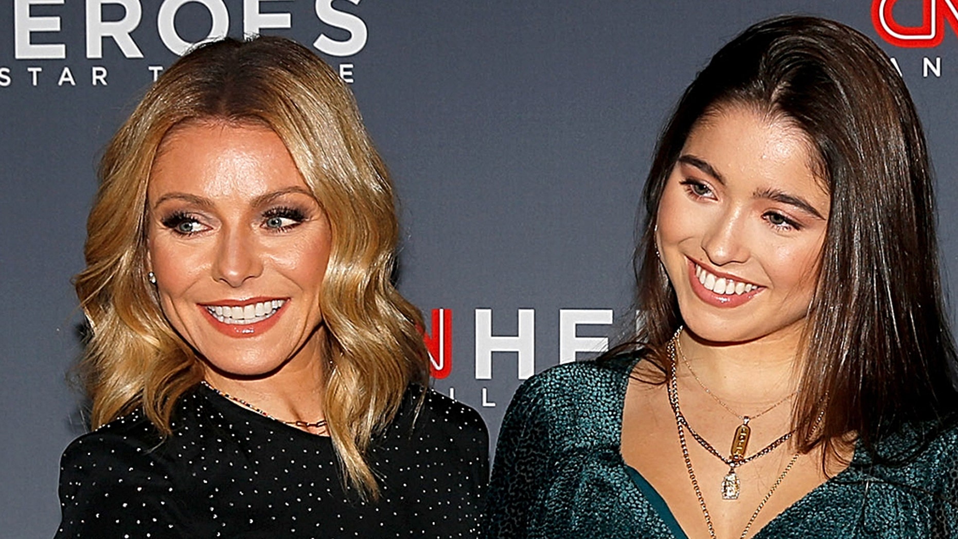 Kelly Ripa (left) and her daughter Lola Grace Consuelos.