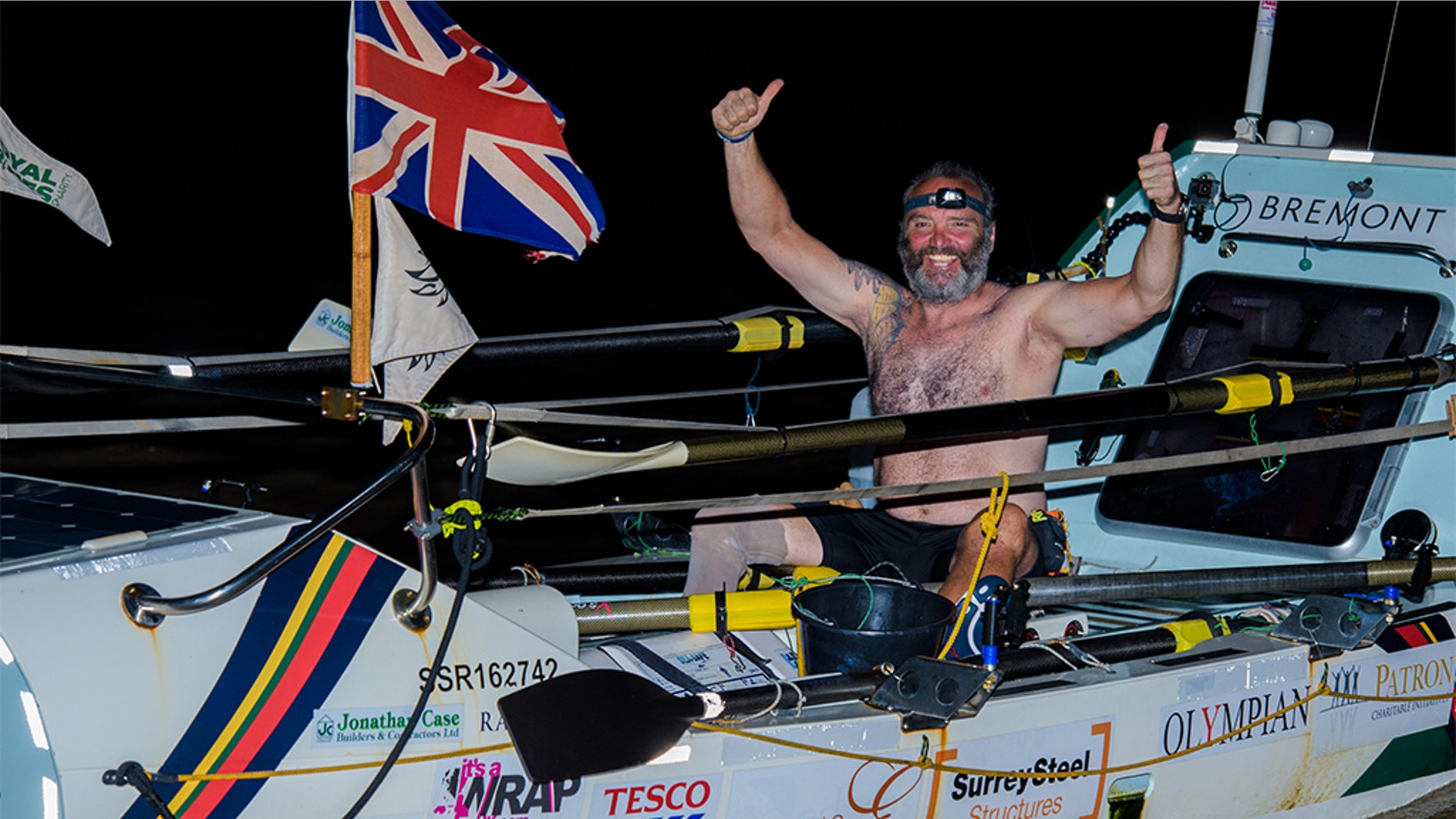 Lee Spencer celebrates after arriving in Cayenne, French Guiana early Monday. (Photo by Anthony Upton/ Rowing Marine via Getty Images)
