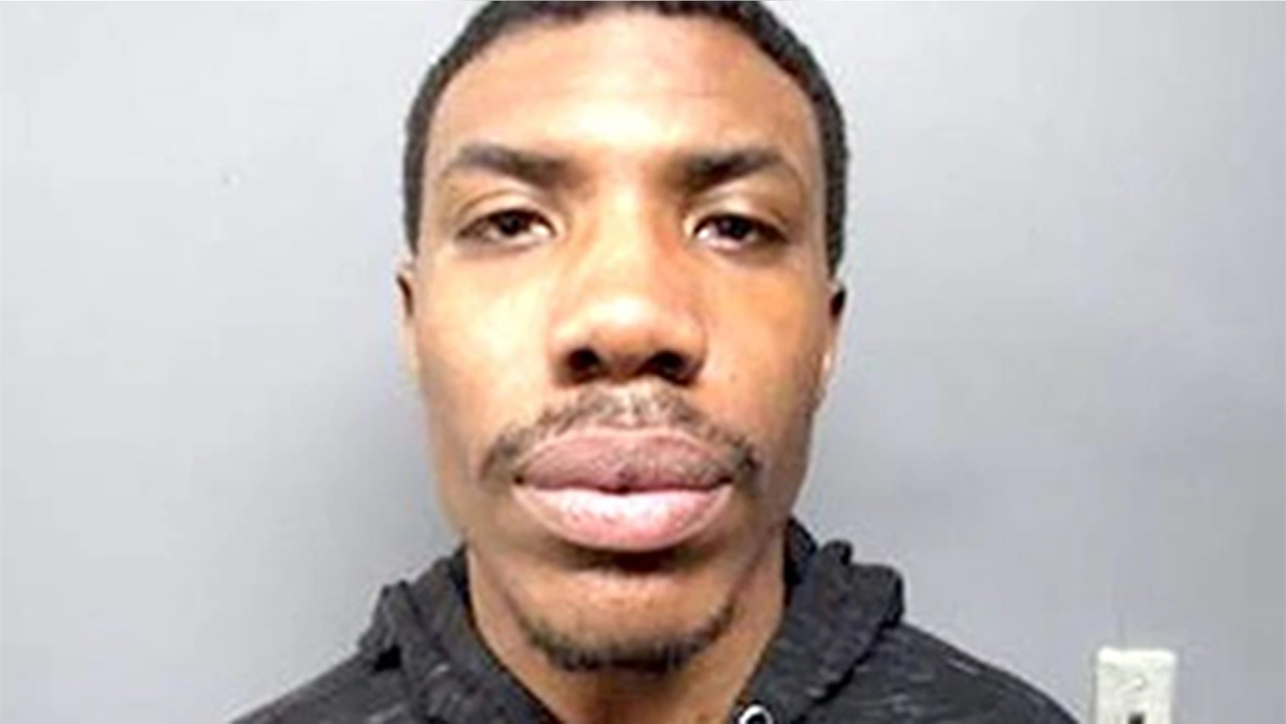 Malik Evans, 23, is accused of stealing an unattended running vehicle in Hackensack, N.J. He was tracked down with the help of footprints in the snow.