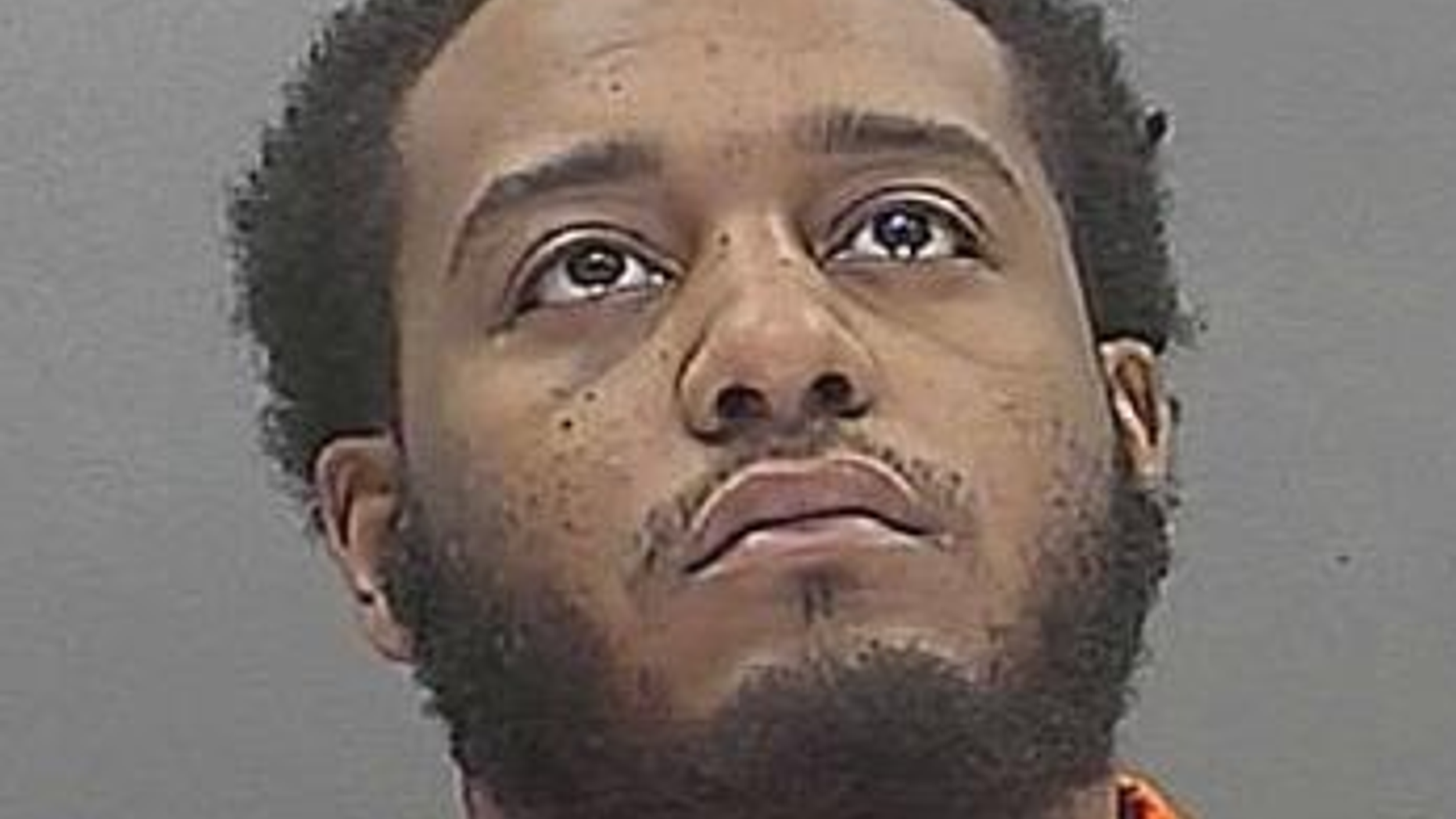 Ossie Thomas has been accused of crashing a vehicle earlier this year that killed his son and injured the boy's twin brother.