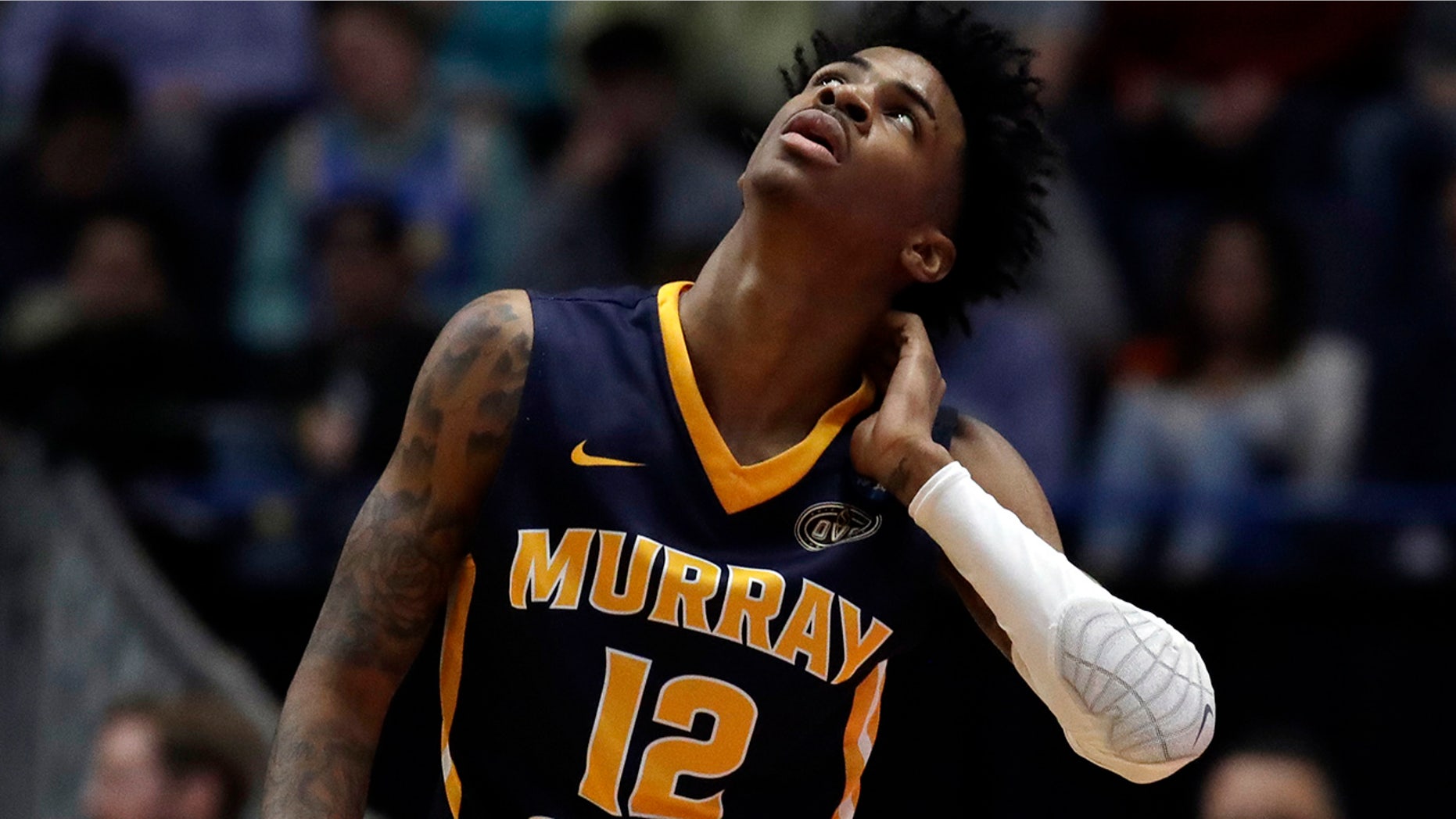 Murray State's Ja Morant (12) looks up at the scoreboard during the first half of a second-round men's college basketball game against Florida State in the NCAA Tournament, Saturday, March 23, 2019, in Hartford, Conn. (Associated Press)