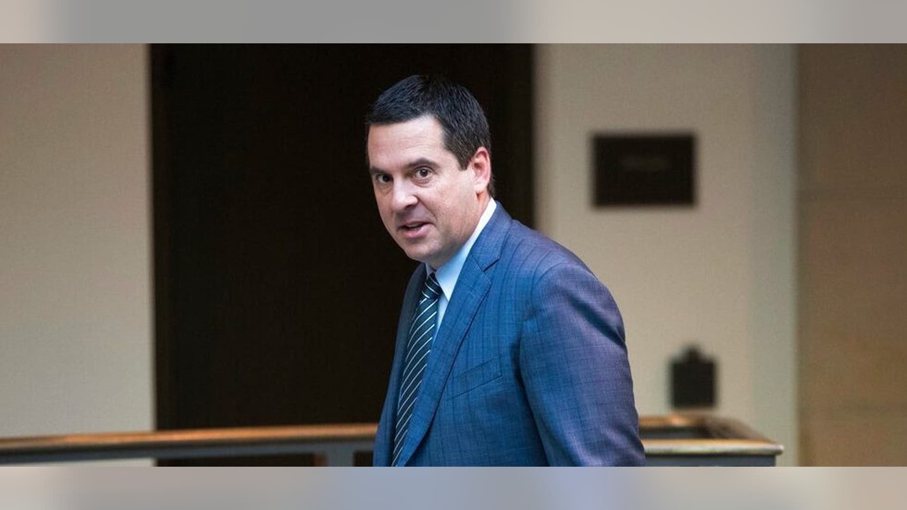 FILE - In this Feb. 27, 2018 file photo, House Intelligence Committee Chairman Devin Nunes, R-Calif., a close ally of President Donald Trump, arrives at the Capitol in Washington. Nunes is suing Twitter and several of its users for more than $250 million, accusing them of defamation and negligence. The suit filed Monday, March 18, 2019, in Virginia accuses Twitter of "knowingly hosting and monetizing content that is clearly abusive, hateful and defamatory." (AP Photo/J. Scott Applewhite, File)