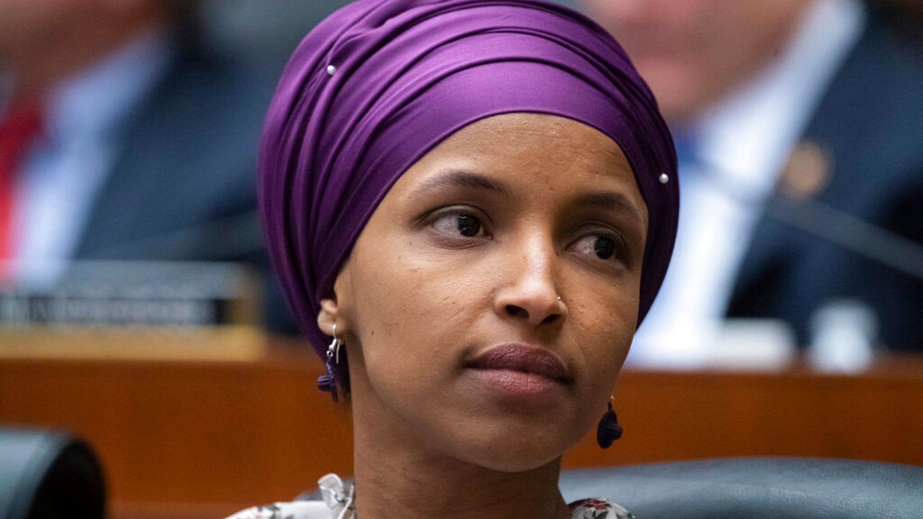 Rep. Ilhan Omar, D-Minn., sits with fellow Democrats on the House Education and Labor Committee during a bill markup, on Capitol Hill in Washington, Wednesday, March 6, 2019. Omar stirred controversy last week saying that Israel's supporters are pushing U.S. lawmakers to take a pledge of "allegiance to a foreign country." Omar is not apologizing for that remark, and progressives are supporting her. (AP Photo/J. Scott Applewhite)
