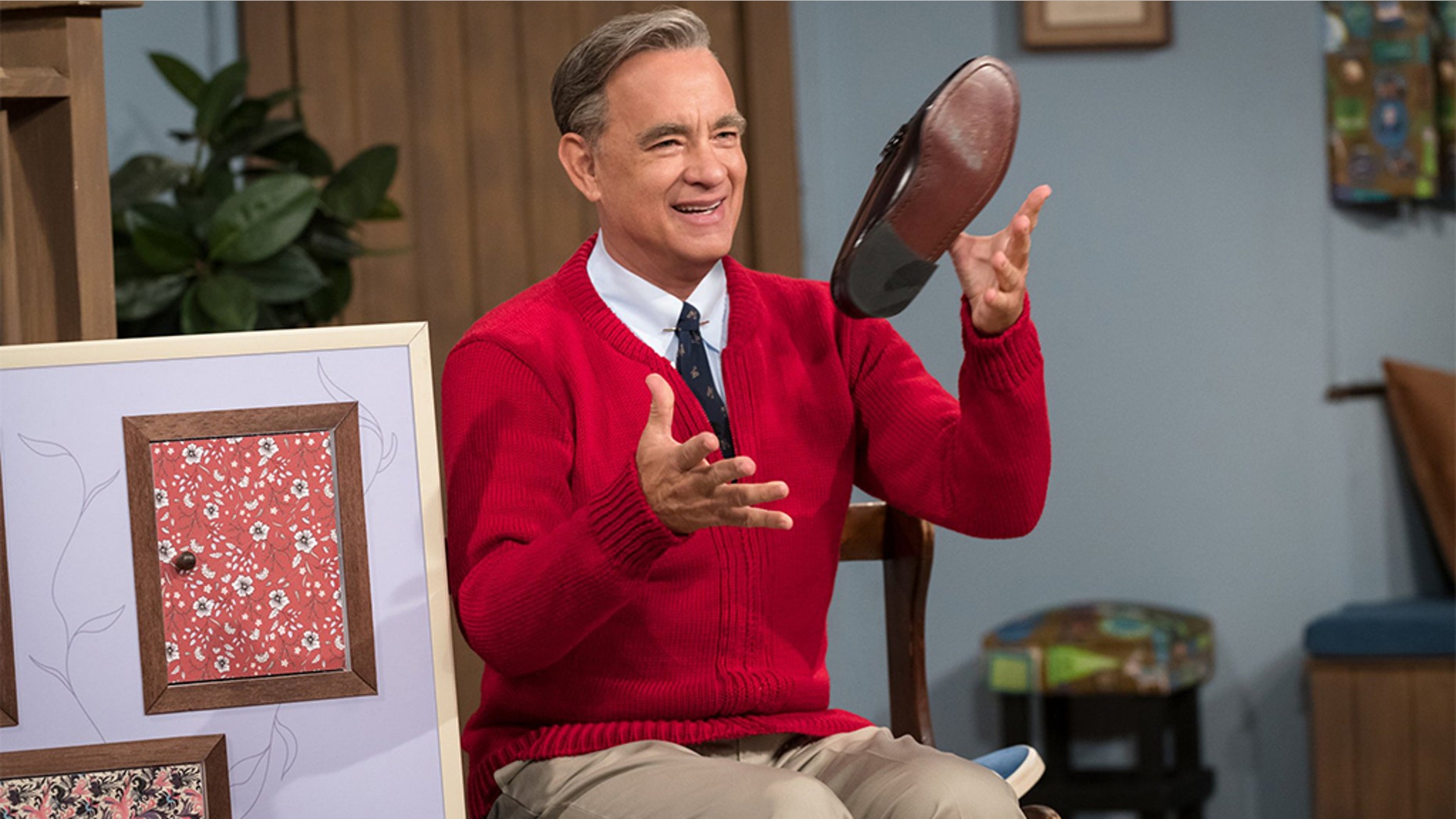 Tom Hanks portrays Mr. Rogers in the upcoming drama "A Beautiful Day in the Neighborhood."