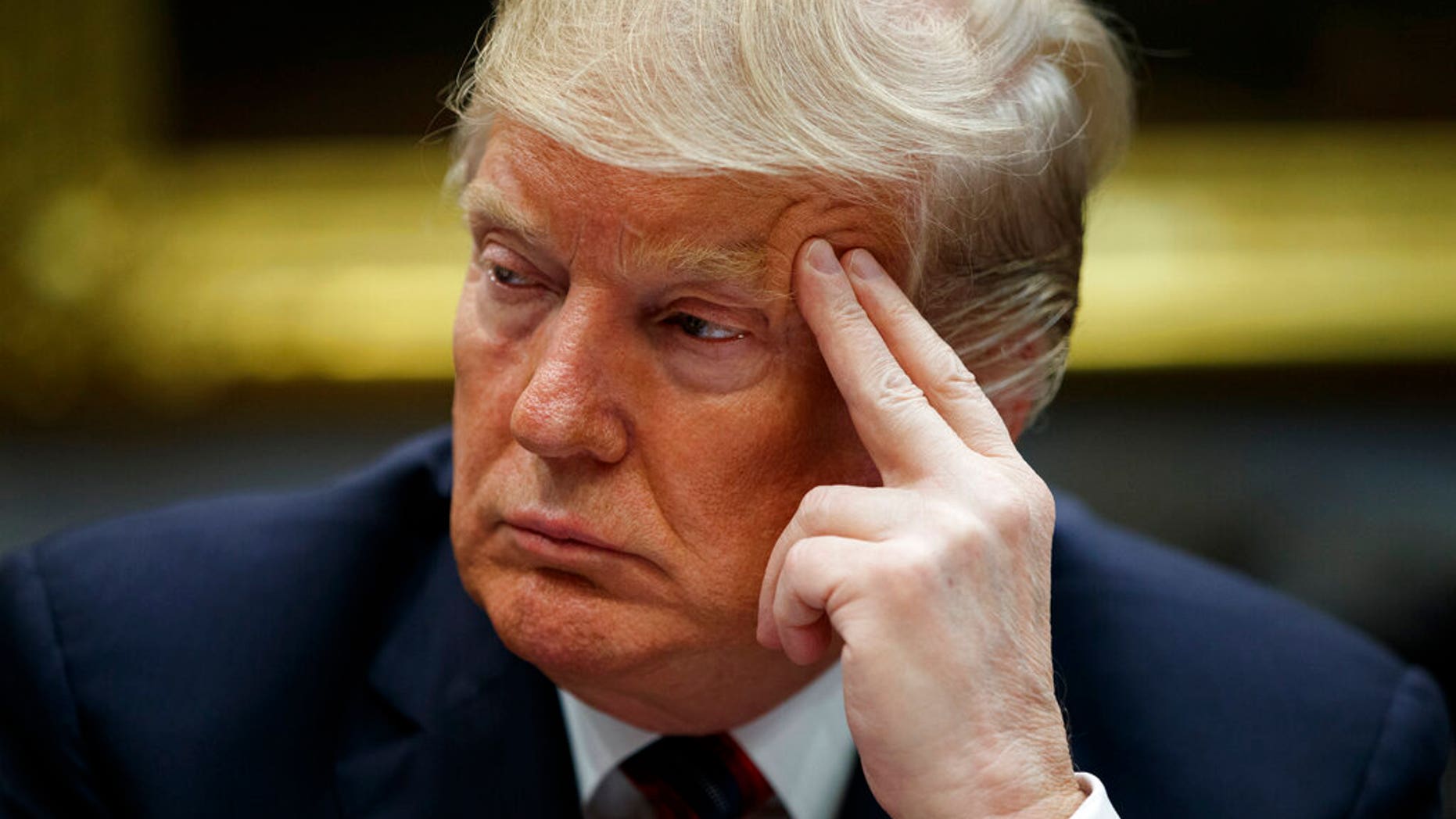 President Donald Trump listens during a briefing on drug trafficking at the southern border in the Roosevelt Room of the White House, Wednesday, March 13, 2019, in Washington. Trump said during the event the U.S. is issuing an emergency order grounding all Boeing 737 Max 8 and Max 9 aircraft "effective immediately," in the wake of the crash of an Ethiopian Airliner that killed 157 people. (AP Photo/Evan Vucci)