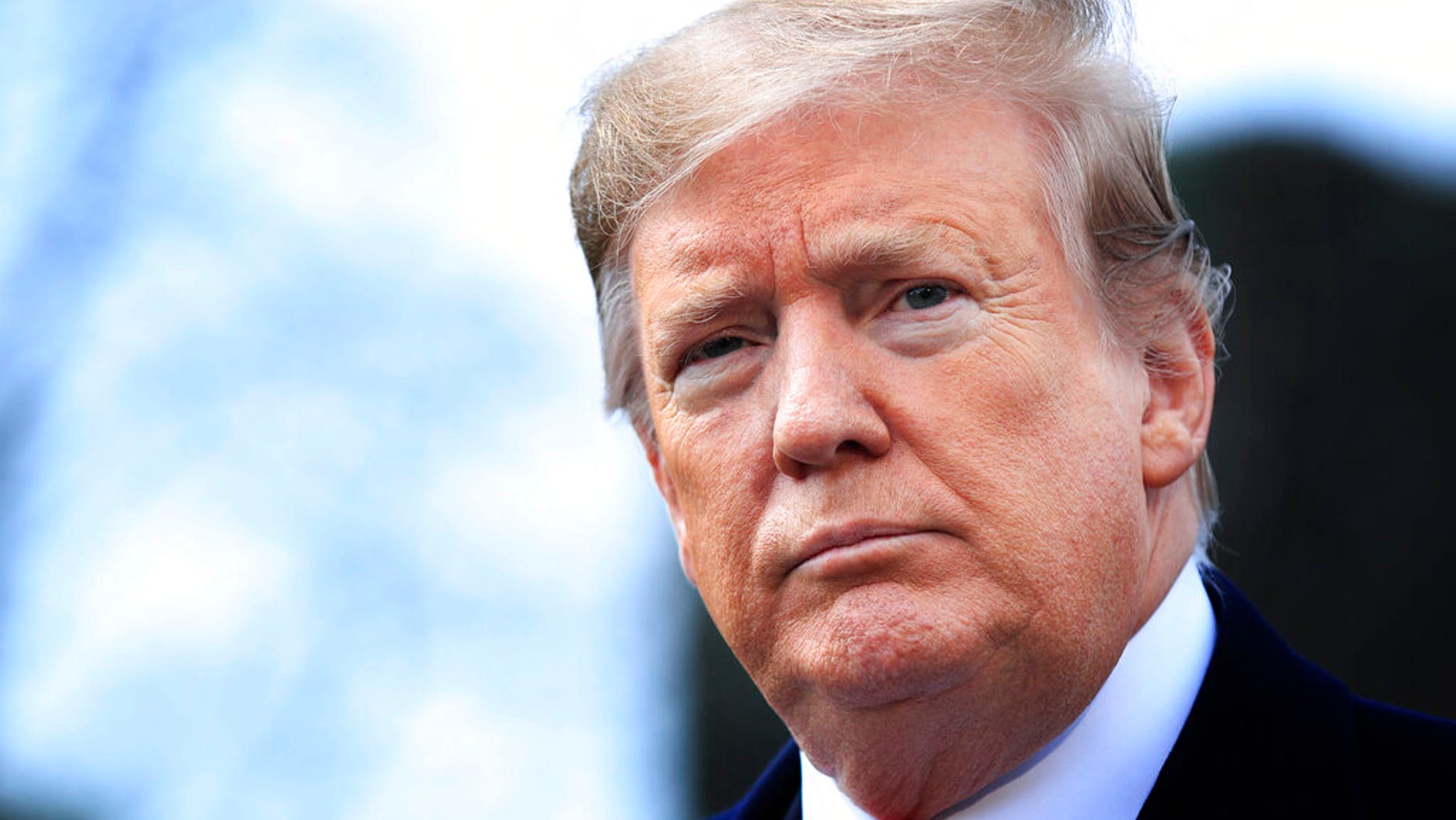 FILE -- In this Wednesday, March 20, 2019 file photo, President Donald Trump speaks to reporters before leaving the White House in Washington. (AP Photo/Manuel Balce Ceneta)