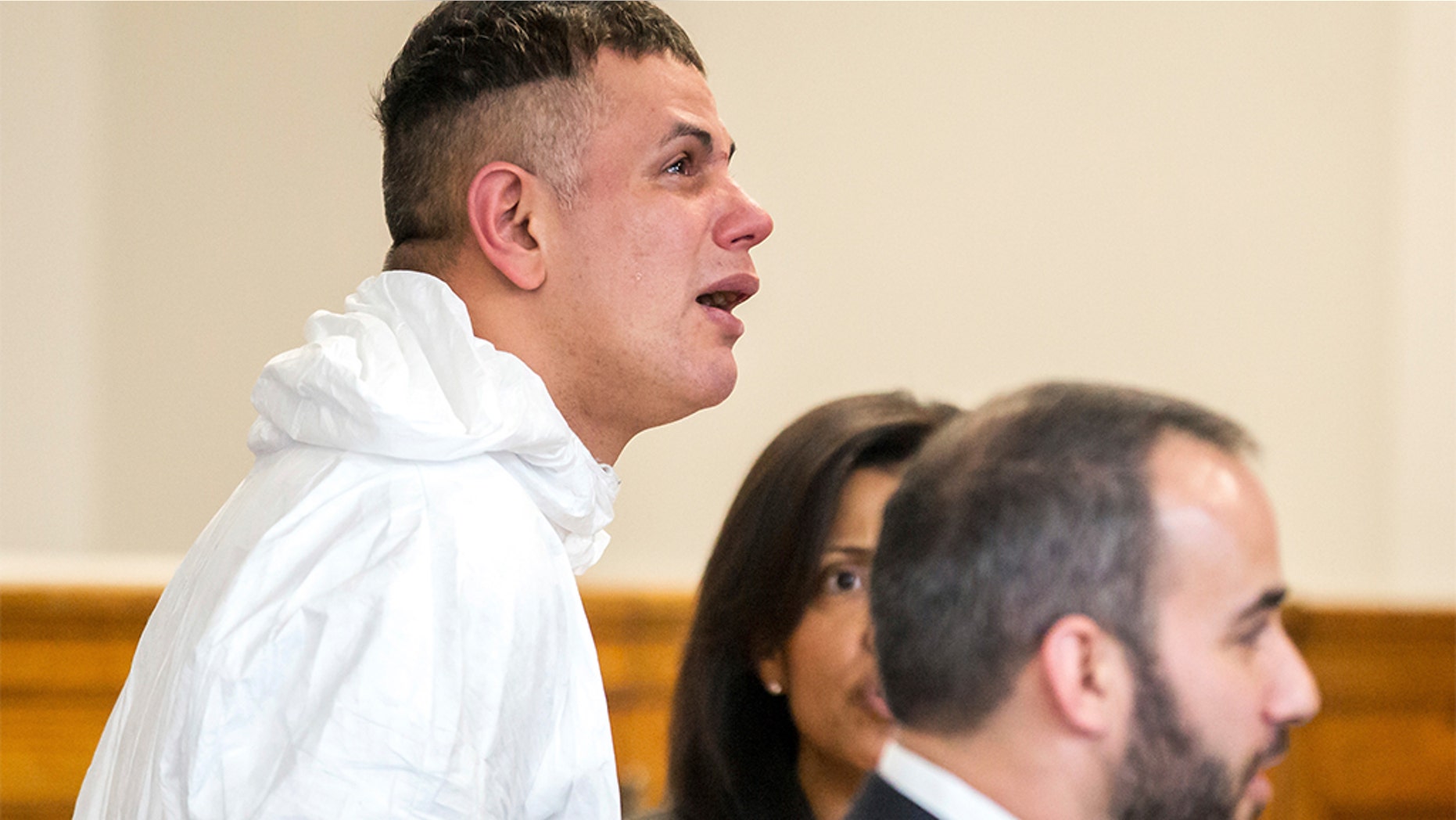 Victor Pena, left, is arraigned on kidnapping charges at the Charlestown Division of the Boston Municipal Court in Charlestown, Massachusetts on Jan. 23.