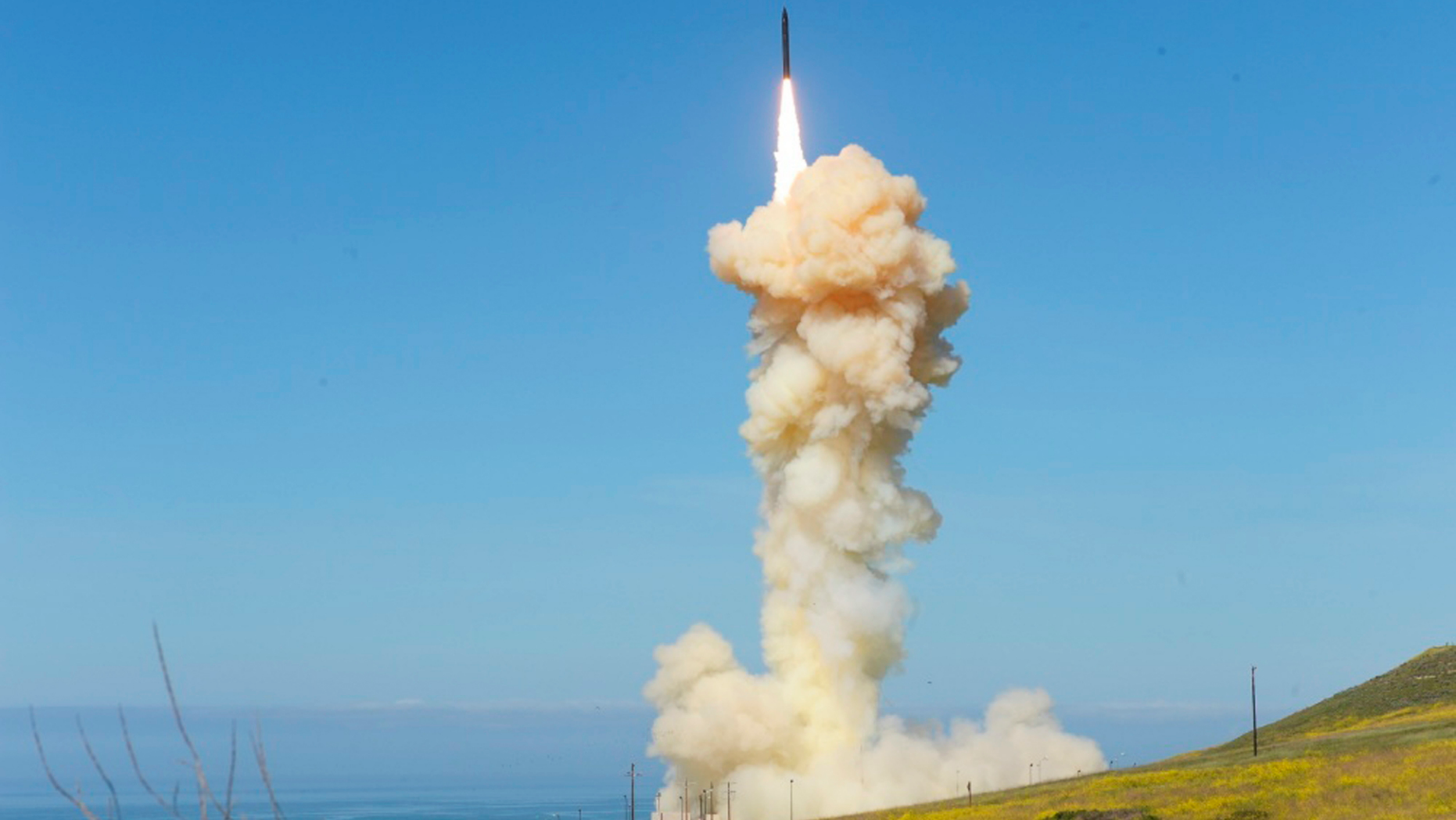 In this photo provided by the Missile Defense Agency, the lead ground-based Interceptor is launched from Vandenberg Air Force Base, Calif., in a "salvo" engagement test of an unarmed missile target Monday, March 25, 2019. In the first test of its kind, the Pentagon on Monday carried out the "salvo" intercept of an unarmed missile soaring over the Pacific, using two interceptor missiles launched from underground silos in southern California. (Missile Defense Agency via AP)