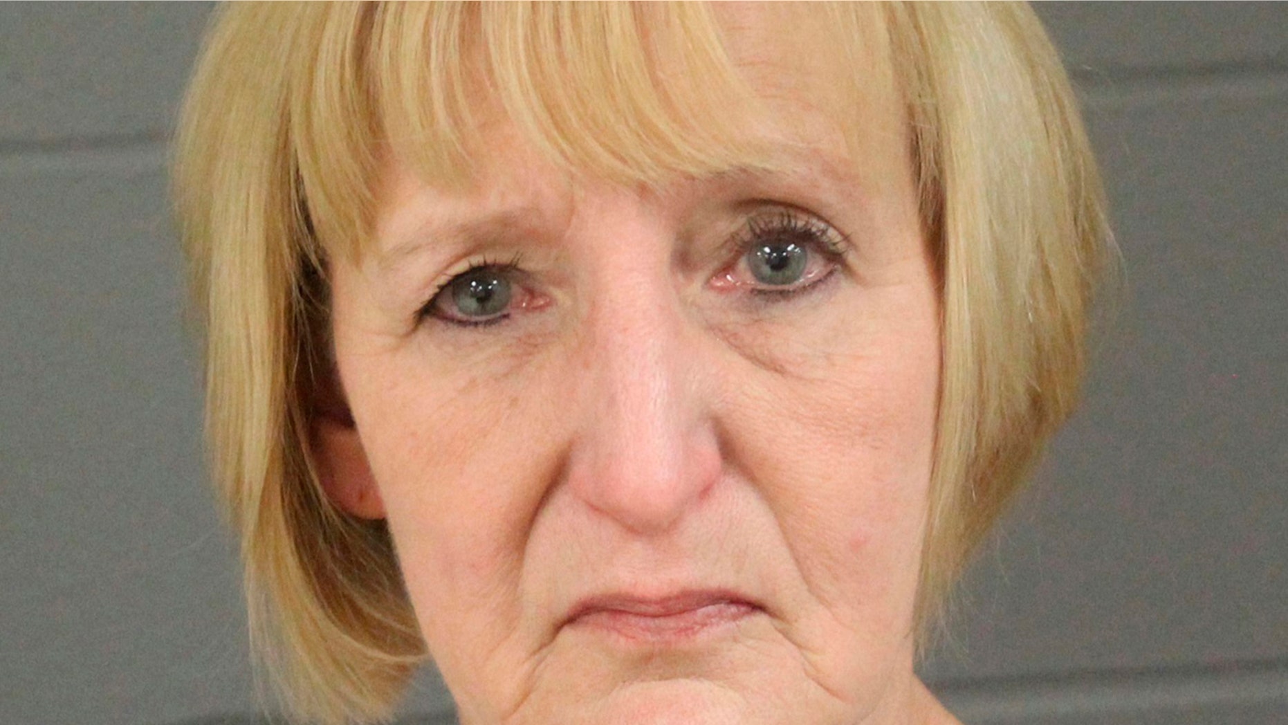 This Friday bilking photo released by Minnehaha County, S.D., Jail shows 57-year-old Theresa Rose Bentaas. (Minnehaha County Jail via KELO via AP