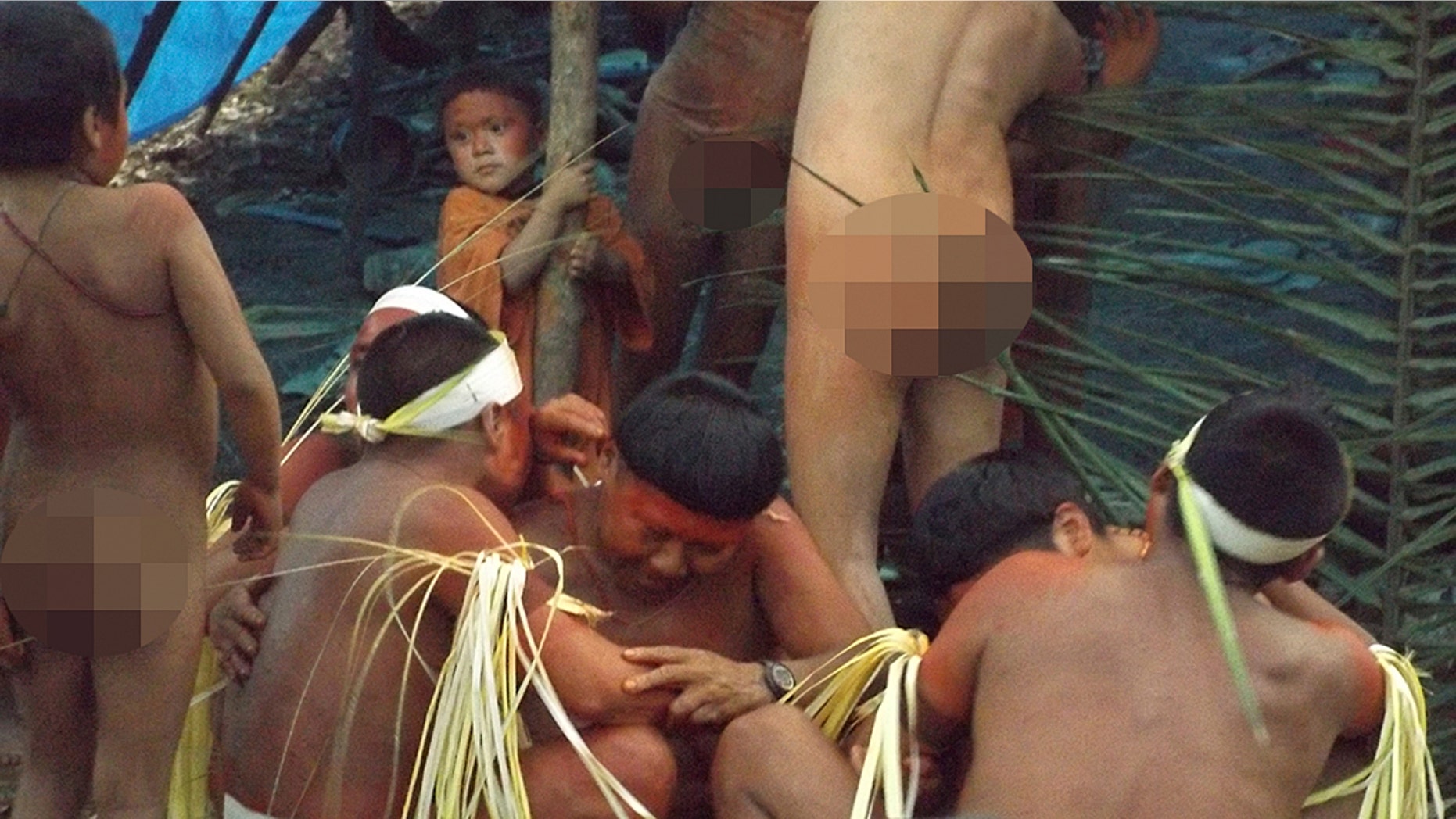 This undated 2014 handout photo released by Brazil’s National Indian Foundation, FUNAI, shows members of the Korubo tribe in the Javari Valley, in the northern state of Amazonas, Brazil.