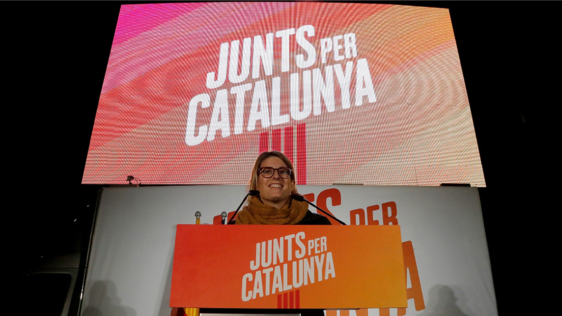 Elsa Atardi addresses the Junts Per Catalunya's campaign closing rally ahead of regional elections in Barceliona, Spain, December 19, 2017.
