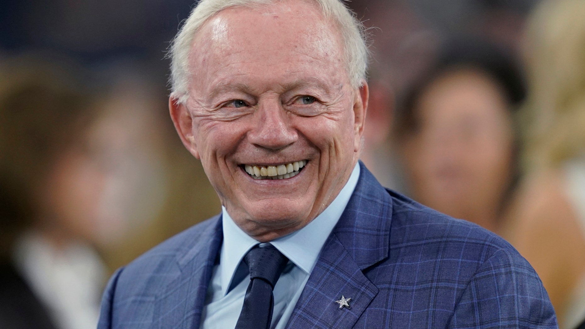 FILE 2018: Dallas Cowboys owner Jerry Jones smiles before the team's NFL football game against the Houston Texans in Houston.