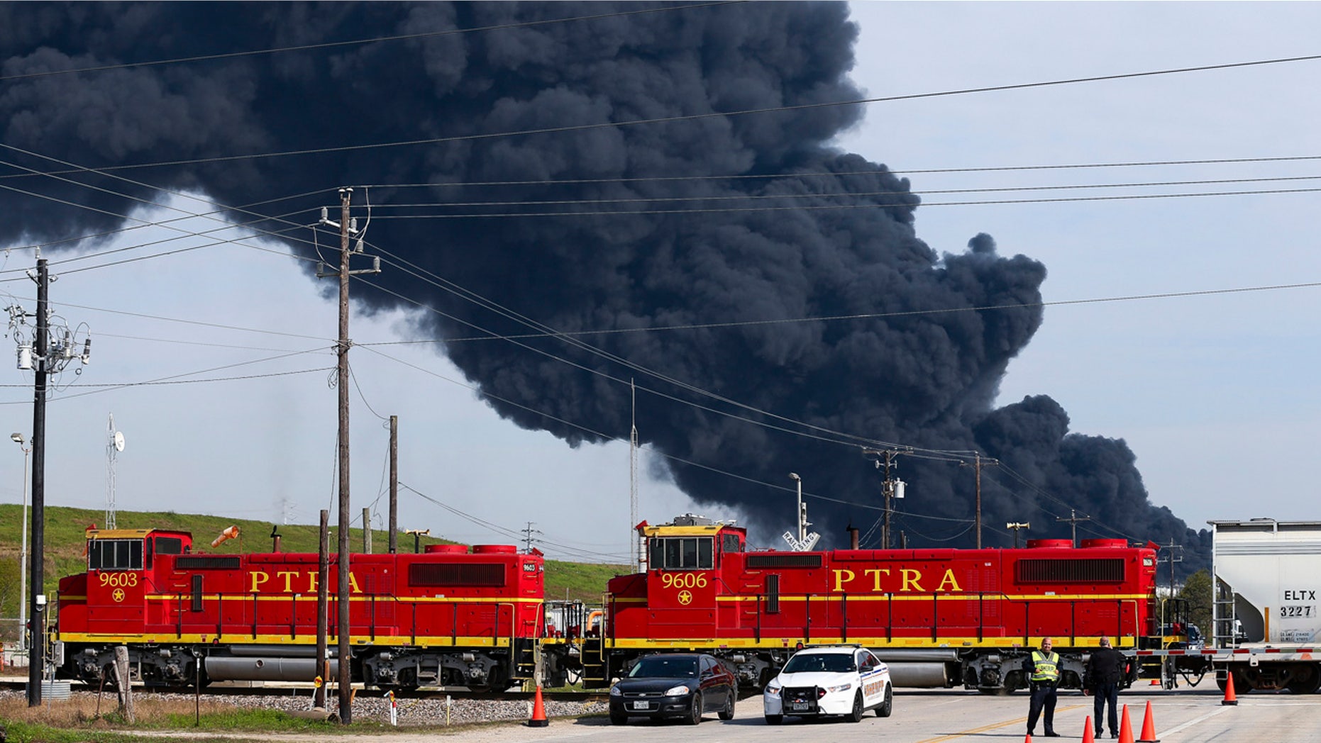 Firefighters battling the petrochemical fire at Intercontinental Terminals Company, which grew in size due to a lack of water pressure earlier this week in Deer Park, Texas. (Godofredo A. Vasquez/Houston Chronicle via AP)