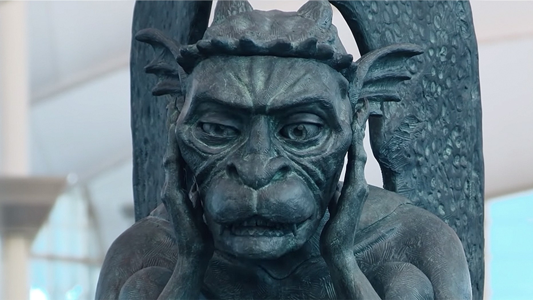 The airport shared footage of the chatty gargoyle surprising passersby to YouTube, where it has since gone viral with over 70,000 views.