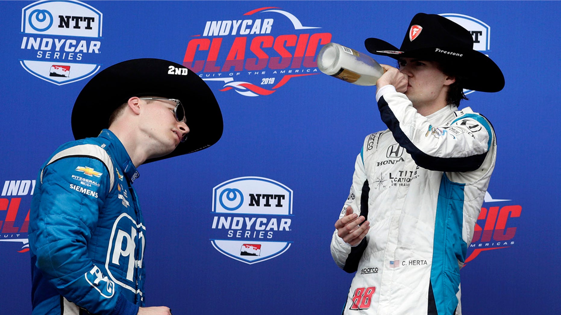 Runner-up Josef Newgarden checked the label on Herta's bottle when he saw him take a drink.