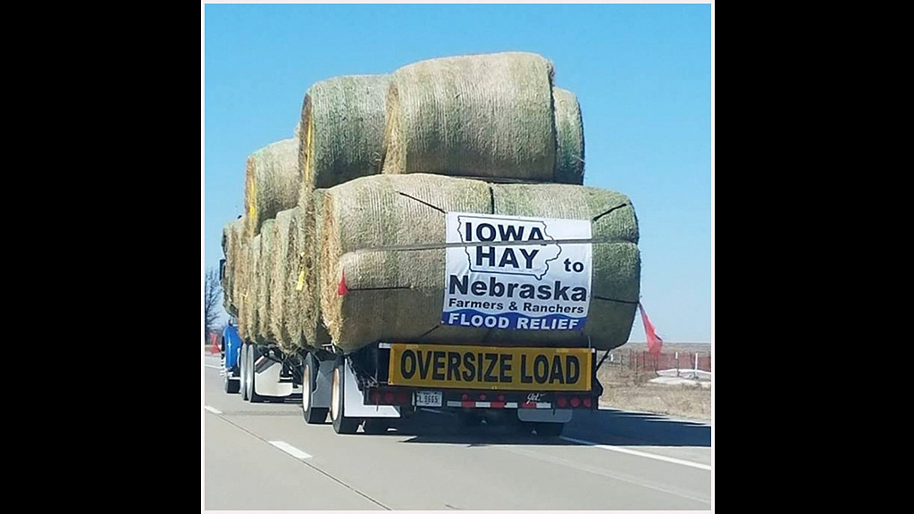 The large semi truck with the caption "Iowa Hay to Nebraska Flood Relief"