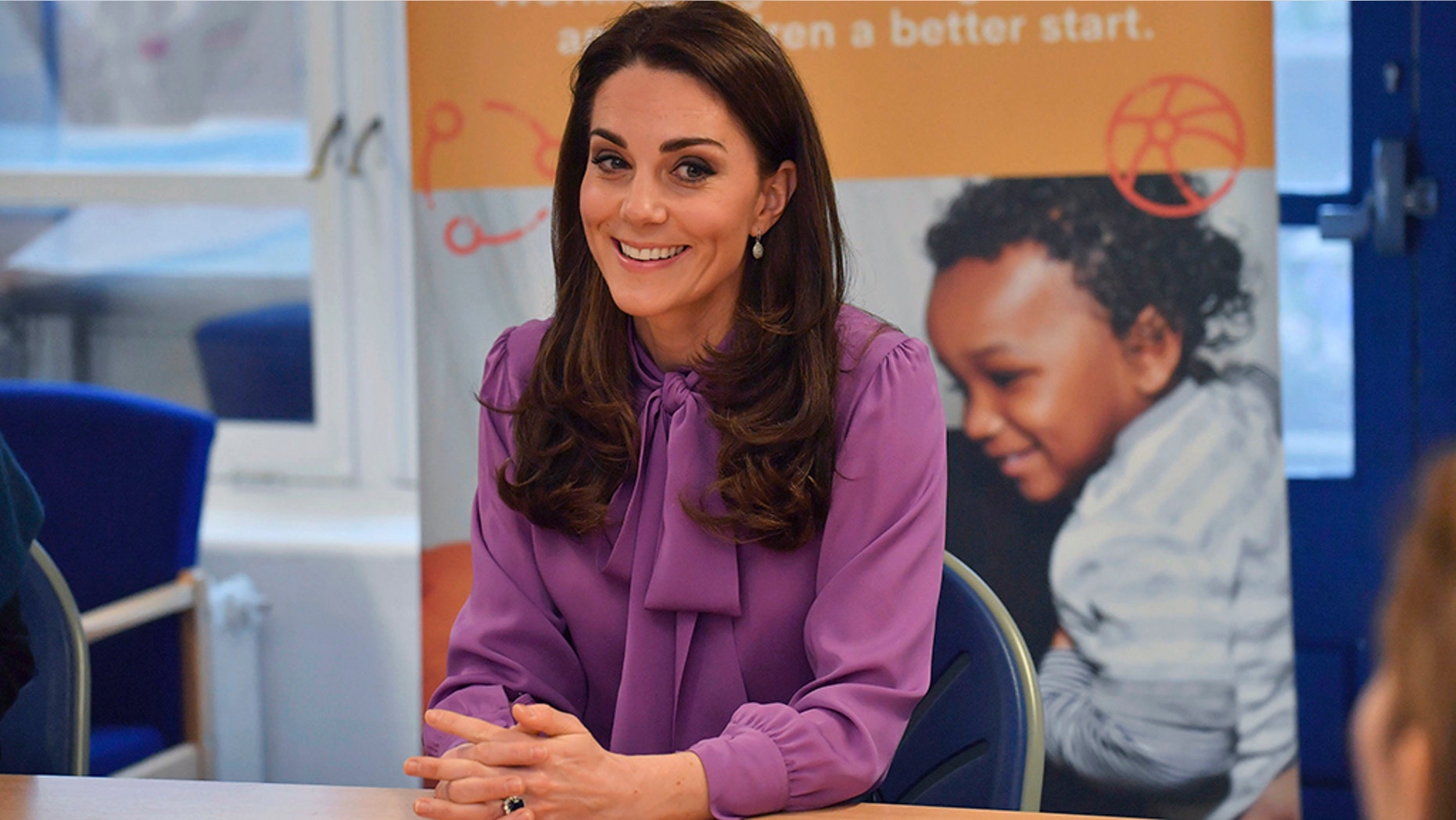 Britain's Kate the Duchess of Cambridge sits, during a visit to the Henry Fawcett Children's Centre in Kennington, London, Tuesday March 12, 2019.
