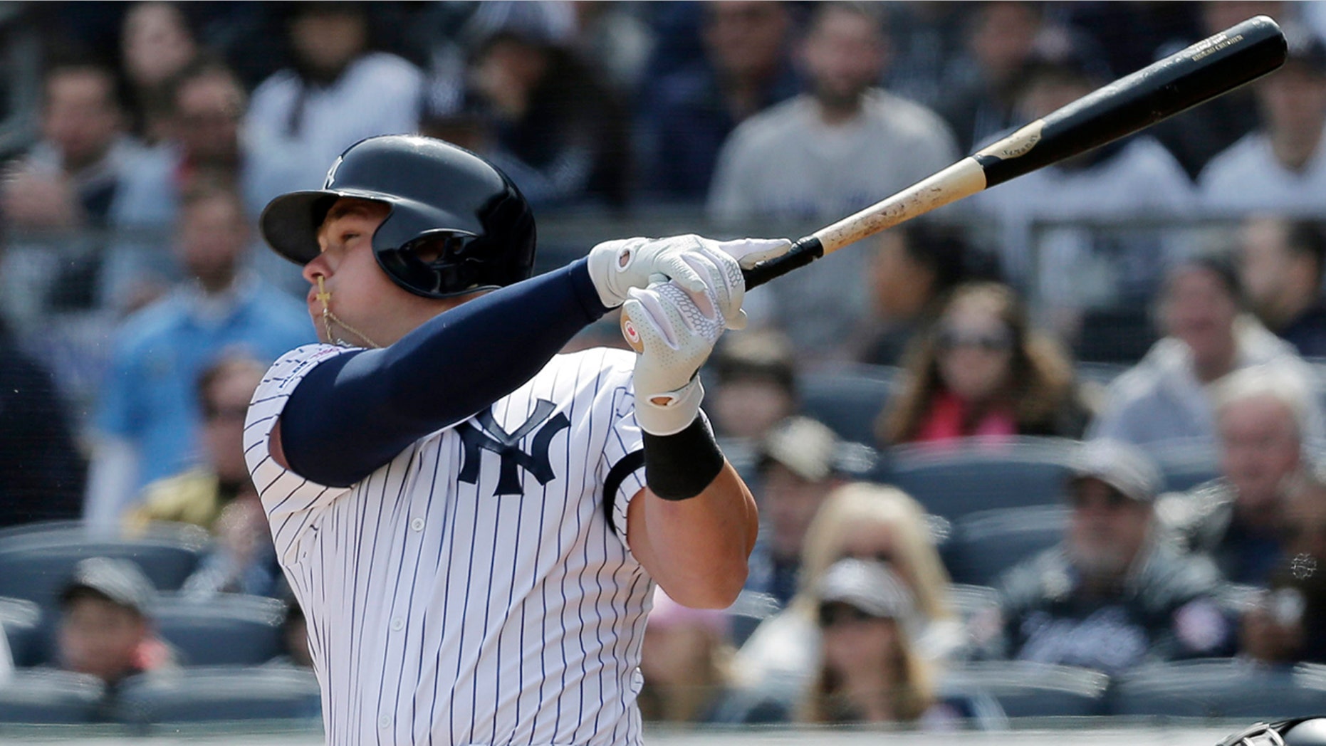 New York Yankees' Luke Voit hits a three-run homer during the first inning of an Opening Day baseball game Thursday against the Baltimore Orioles at Yankee Stadium in New York. (Associated Press)