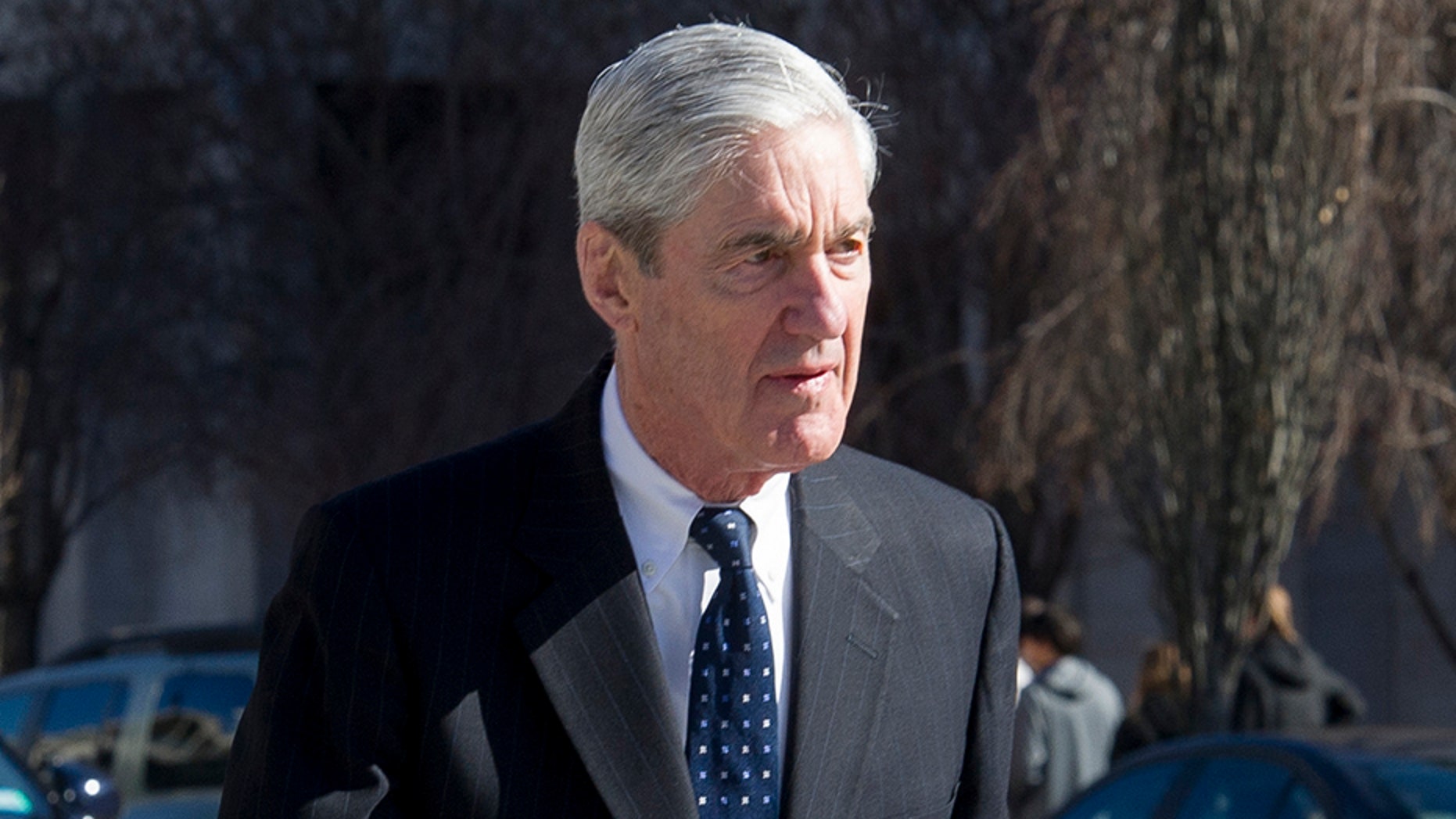 Special Counsel Robert Mueller walks to his car after attending services at St. John's Episcopal Church, across from the White House, in Washington, on Sunday.