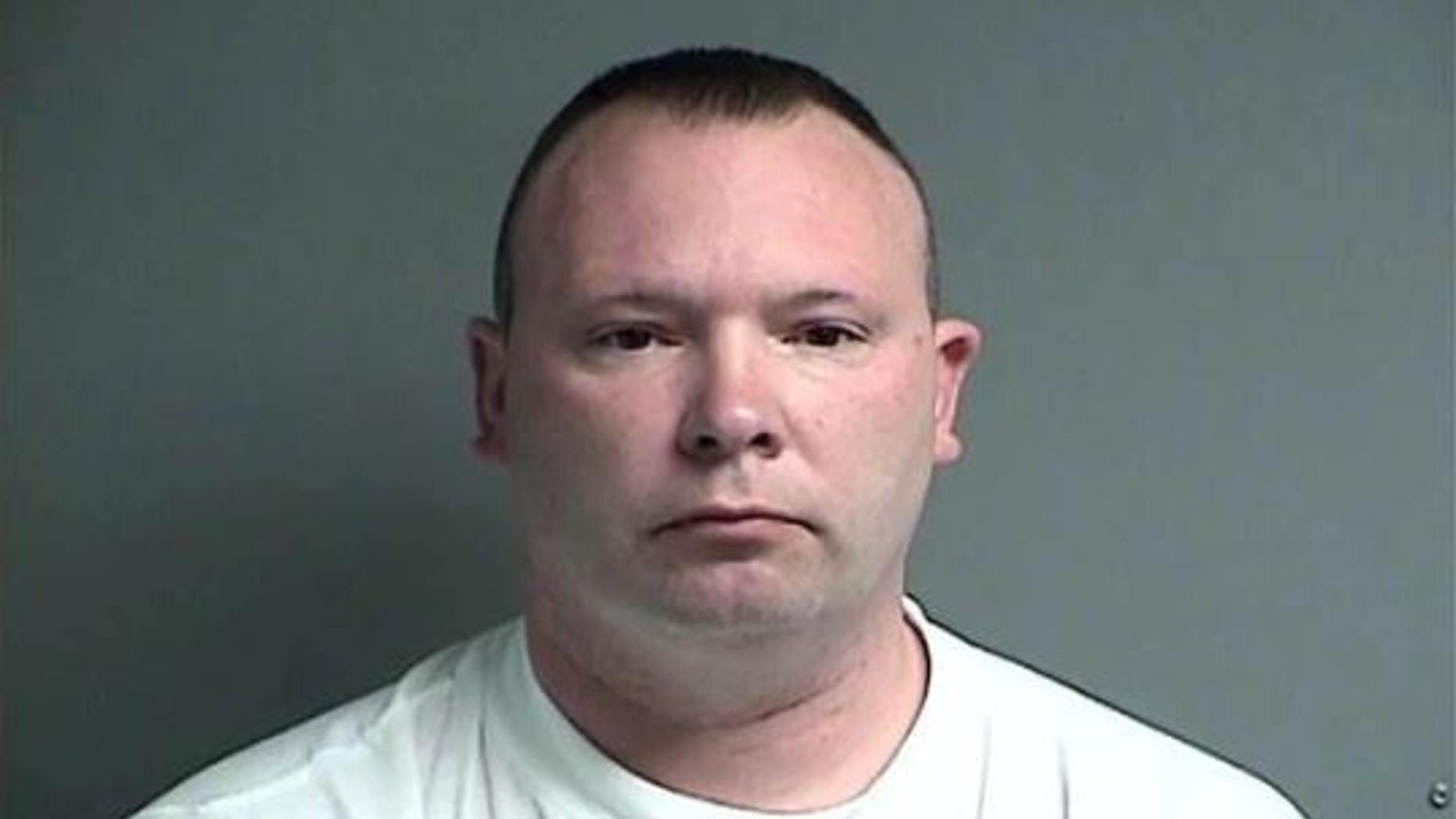 George Gunderman is accused of stealing his police department's cable TV box and seeking pay for time he didn't work.