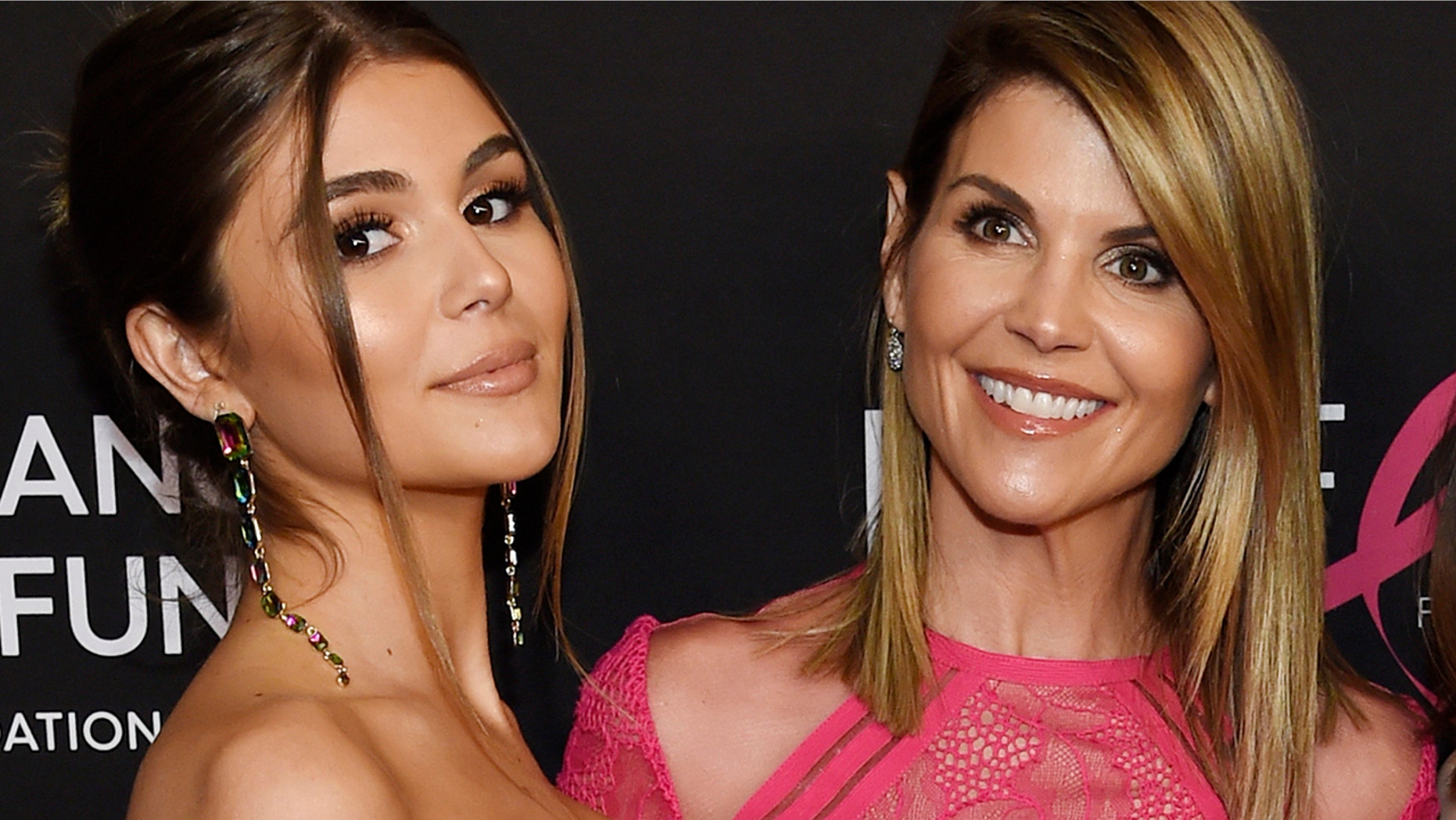 Actress Lori Loughlin poses with her daughter Oliva Jade Giannulli, who are both embattled in the ongoing college admissions scandal.