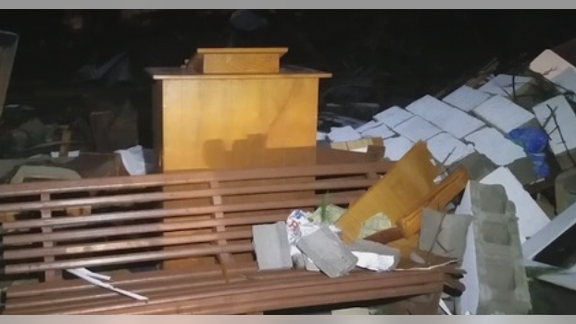 A powerful wind storm devastated a Georgia town Sunday afternoon, but a pulpit was left standing amid the destruction.
