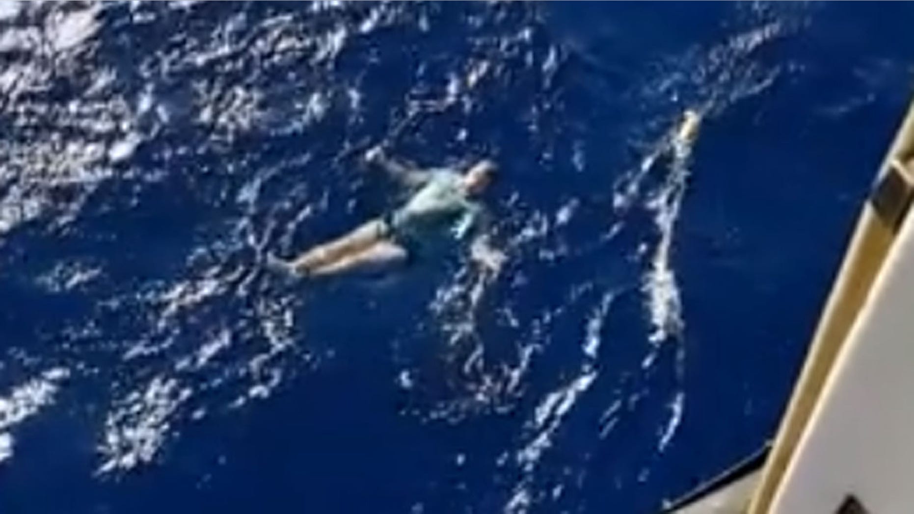 The moment Arne Murke was rescued after spending nearly 4 hours in the open sea after using his jeans at a lifejacket.