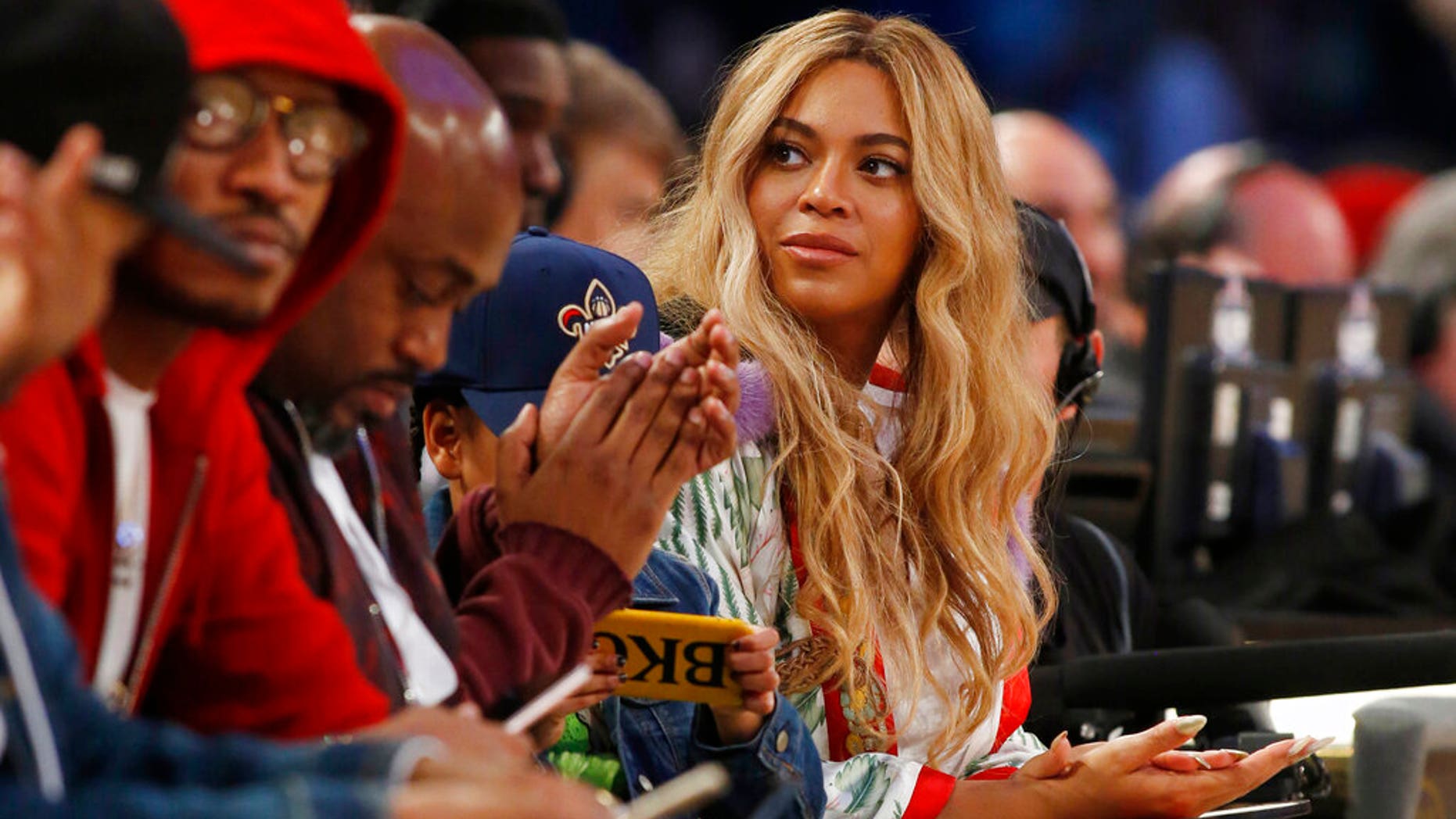 FILE: Beyonce sits at court side during the second half of the NBA All-Star basketball game in New Orleans.