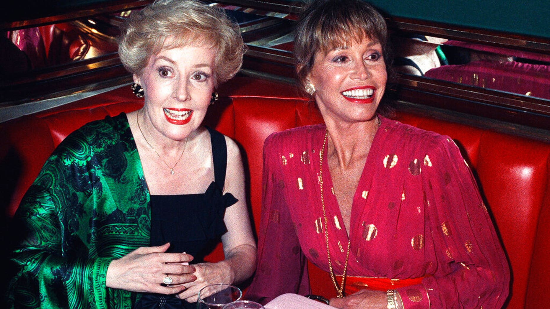 FILE: Mary Tyler Moore, right, is joined by former