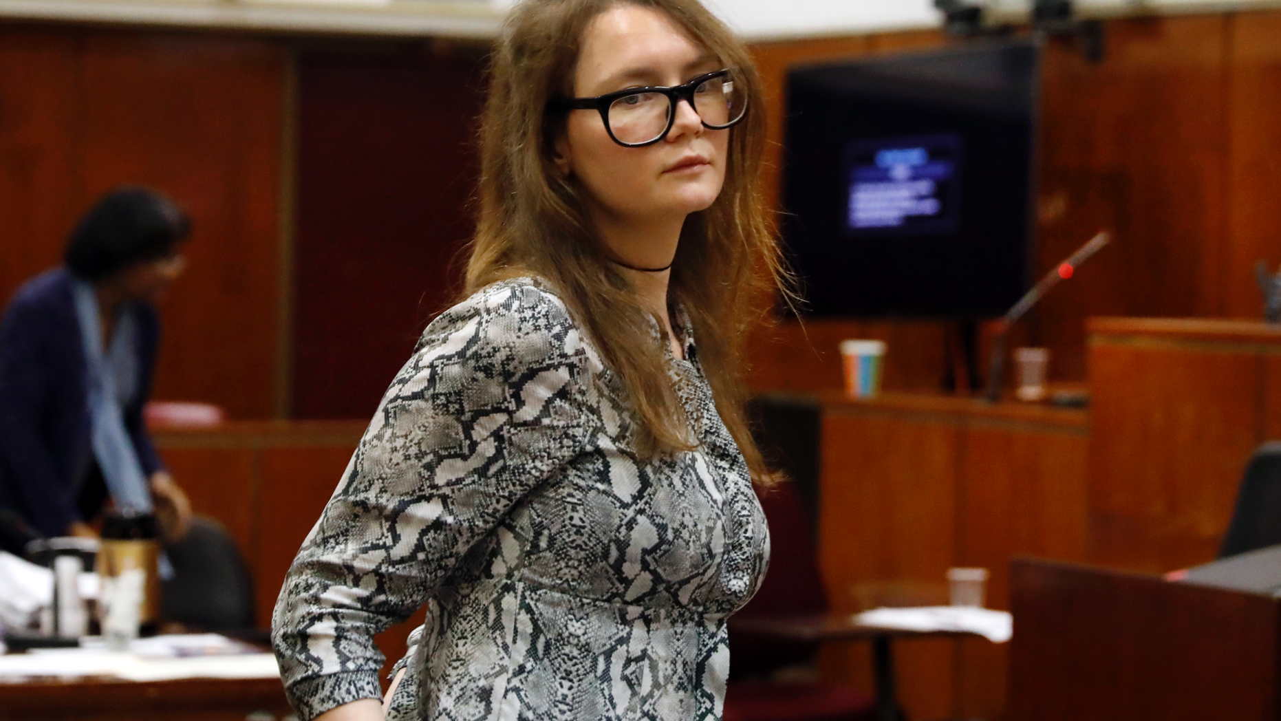 Anna Sorokin leaves during the lunch break at her trial in New York State Supreme Court, in New York, Monday, April 22, 2019. Sorokin, who claimed to be a German heiress, is on trial on grand larceny and theft of services charges. (AP Photo/Richard Drew)