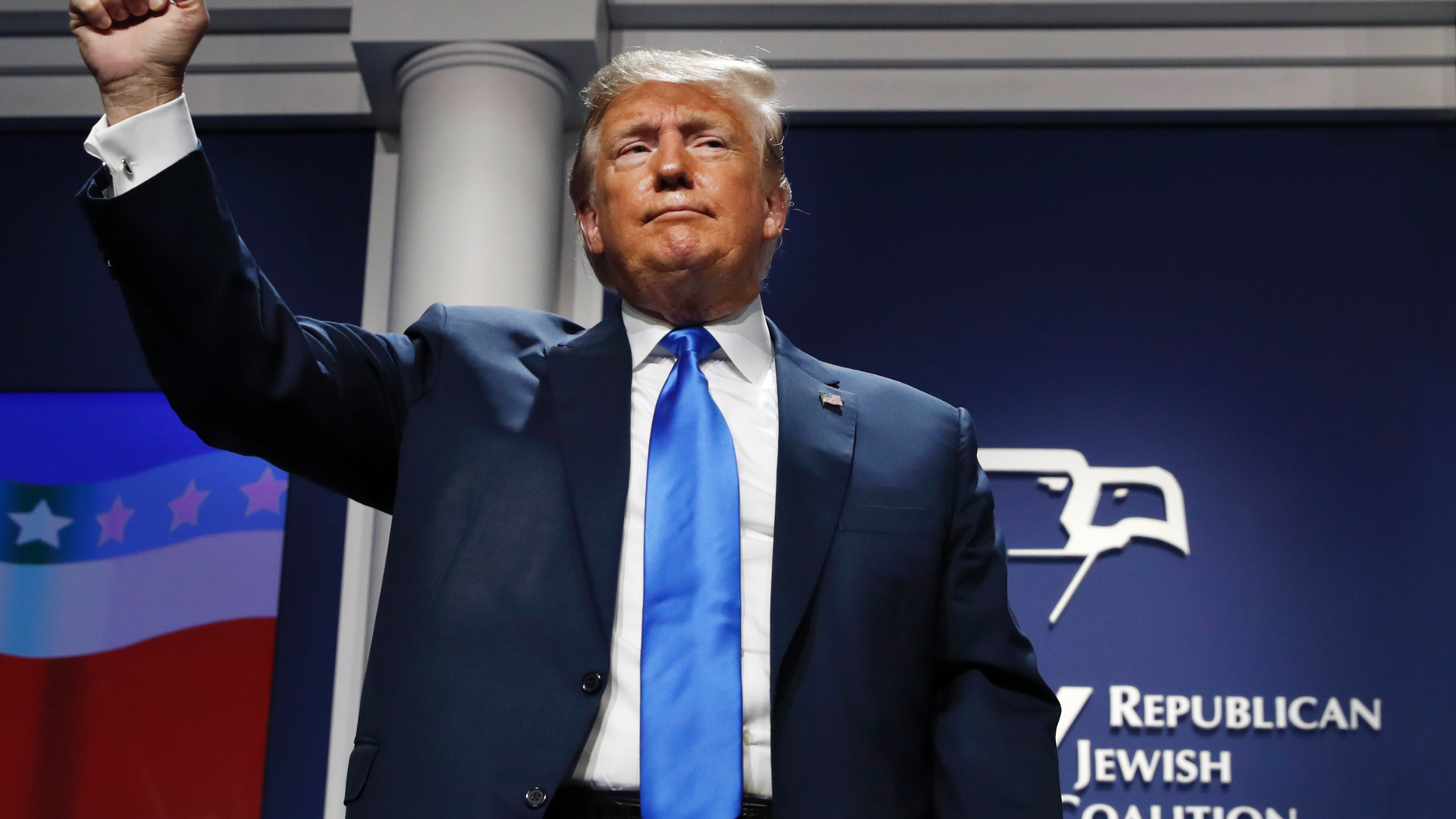 President Donald Trump holds up his fist as he finishes his speech at the Republican Jewish Coalition's annual leadership meeting, Saturday April 6, 2019, in Las Vegas. (AP Photo/Jacquelyn Martin)