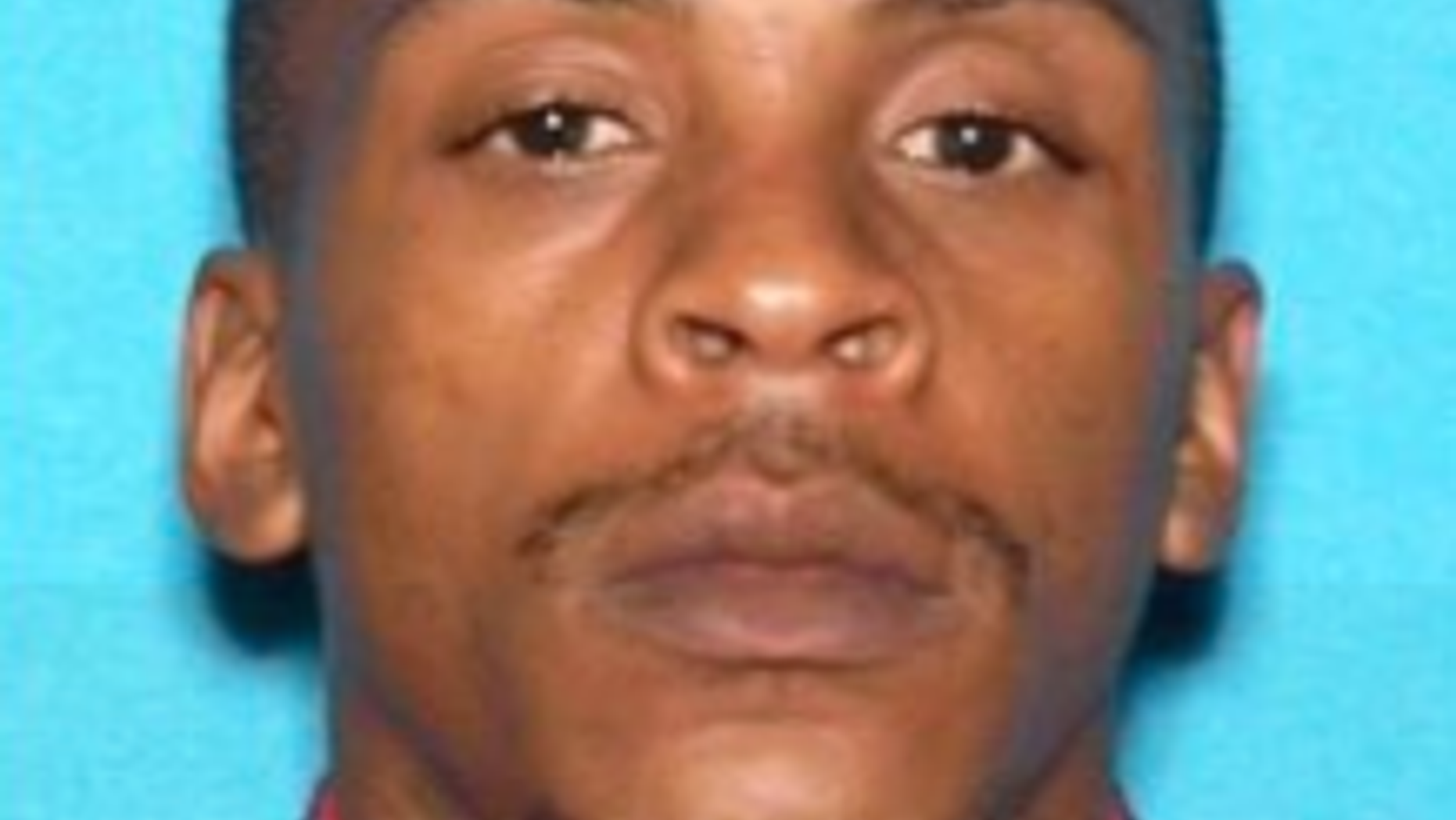 Police say they are searching for Eric Holder, 29, in connection with the shooting death of rapper Nipsey Hussle. (Los Angeles Police Department)