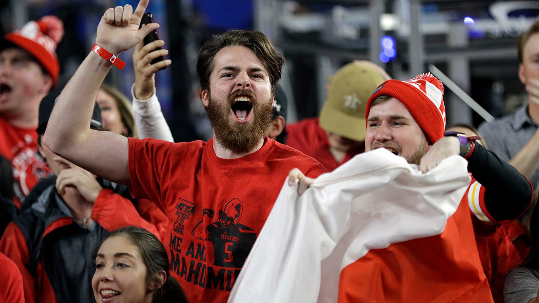 Texas Tech fans cheer before the semifinals of the Final Four NCAA college basketball tournament against Michigan State, Saturday, April 6, 2019, in Minneapolis. (Associated Press)